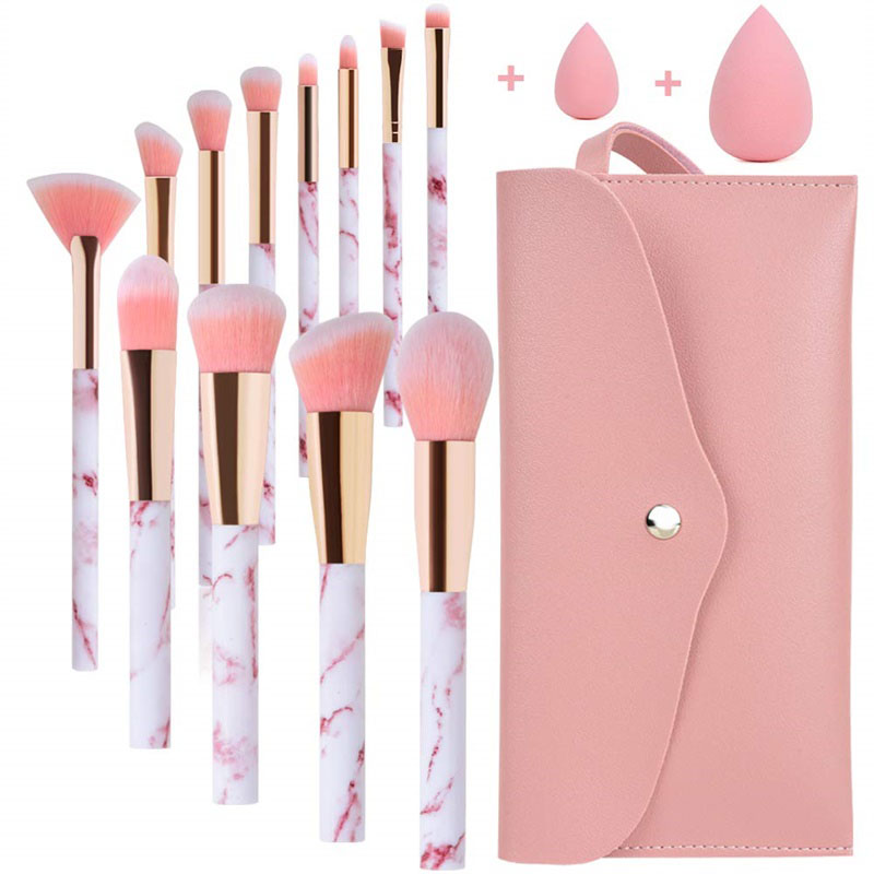 Ensemble de 12 pinceaux de maquillage professionnels START en marbre rose, comprenant des pinceaux pour fond de teint, correcteur, blush et fards à paupières, une éponge à maquillage et une trousse de maquillage.