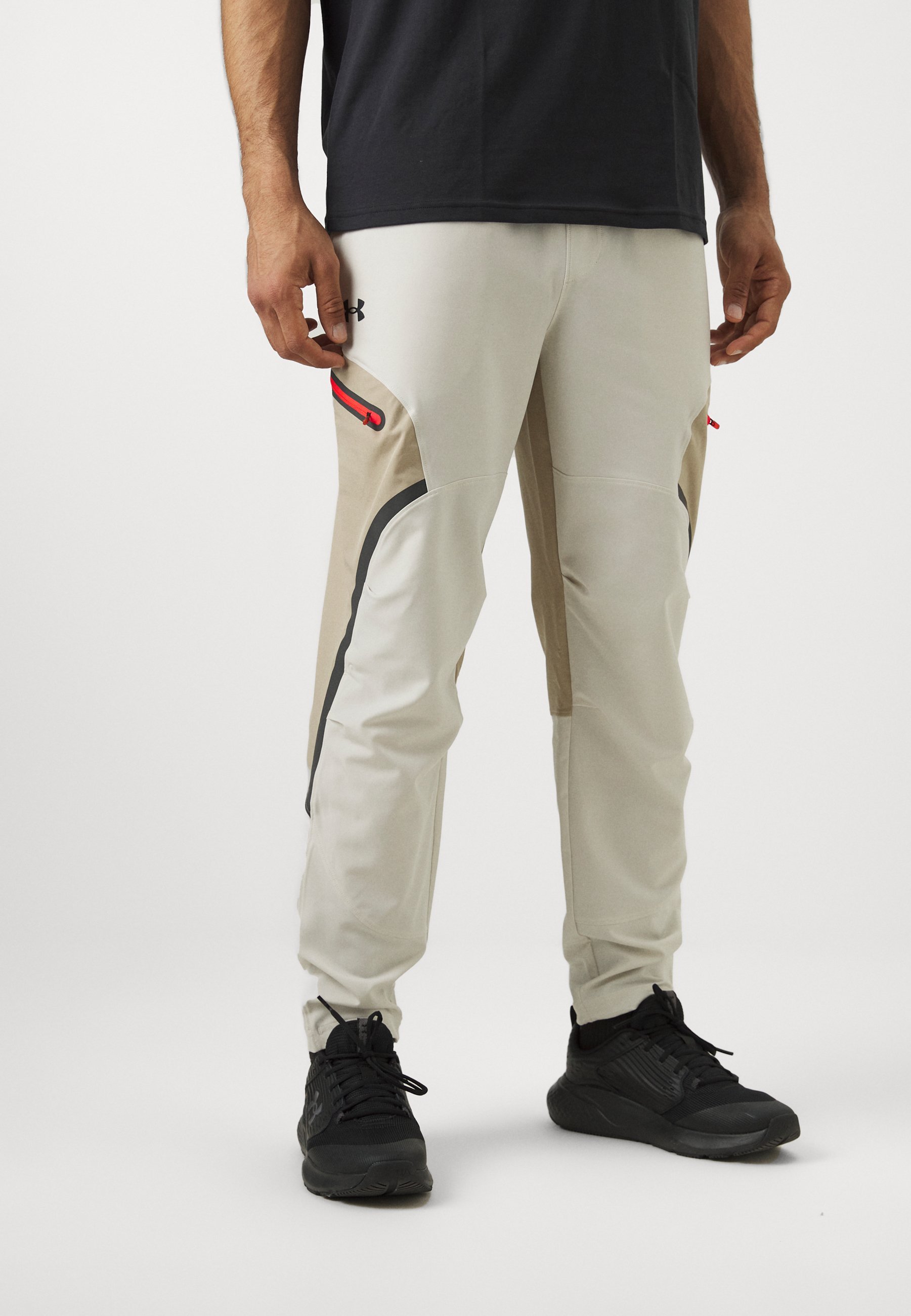 Under Armour UNSTOPPABLE - Dressipüksid - valge/khaki/must