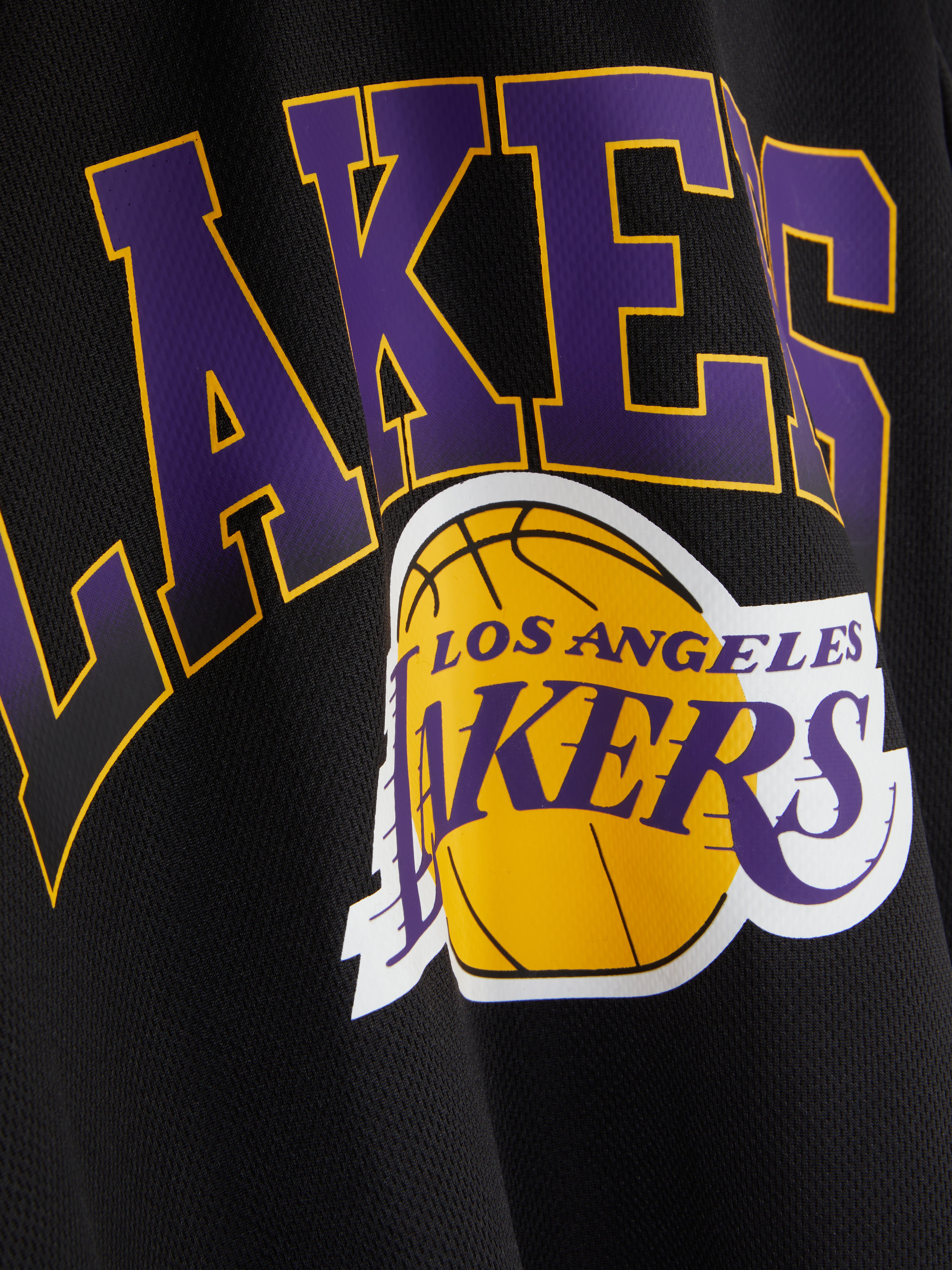 Tricou NBA Los Angeles Lakers Un tricou NBA cu mâneci scurte și imprimeuri Los Angeles Lakers