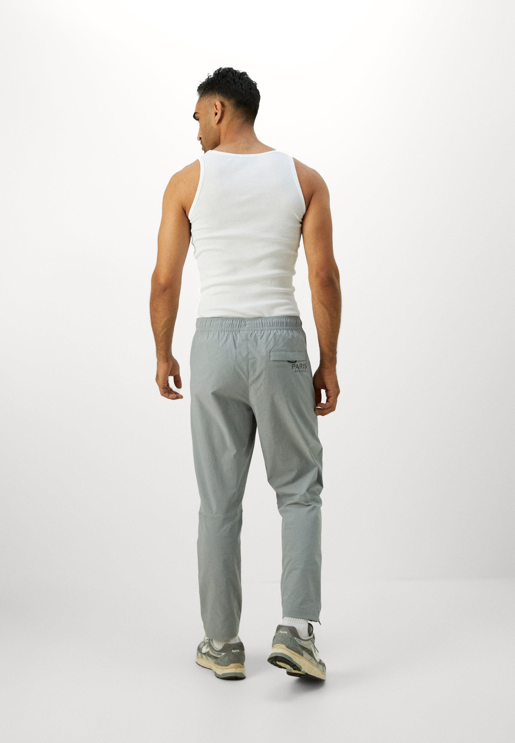 Pantaloni tecnici Nike Performance PARIS SAINT-GERMAIN FC - Abbigliamento da club - grigio particella/argento