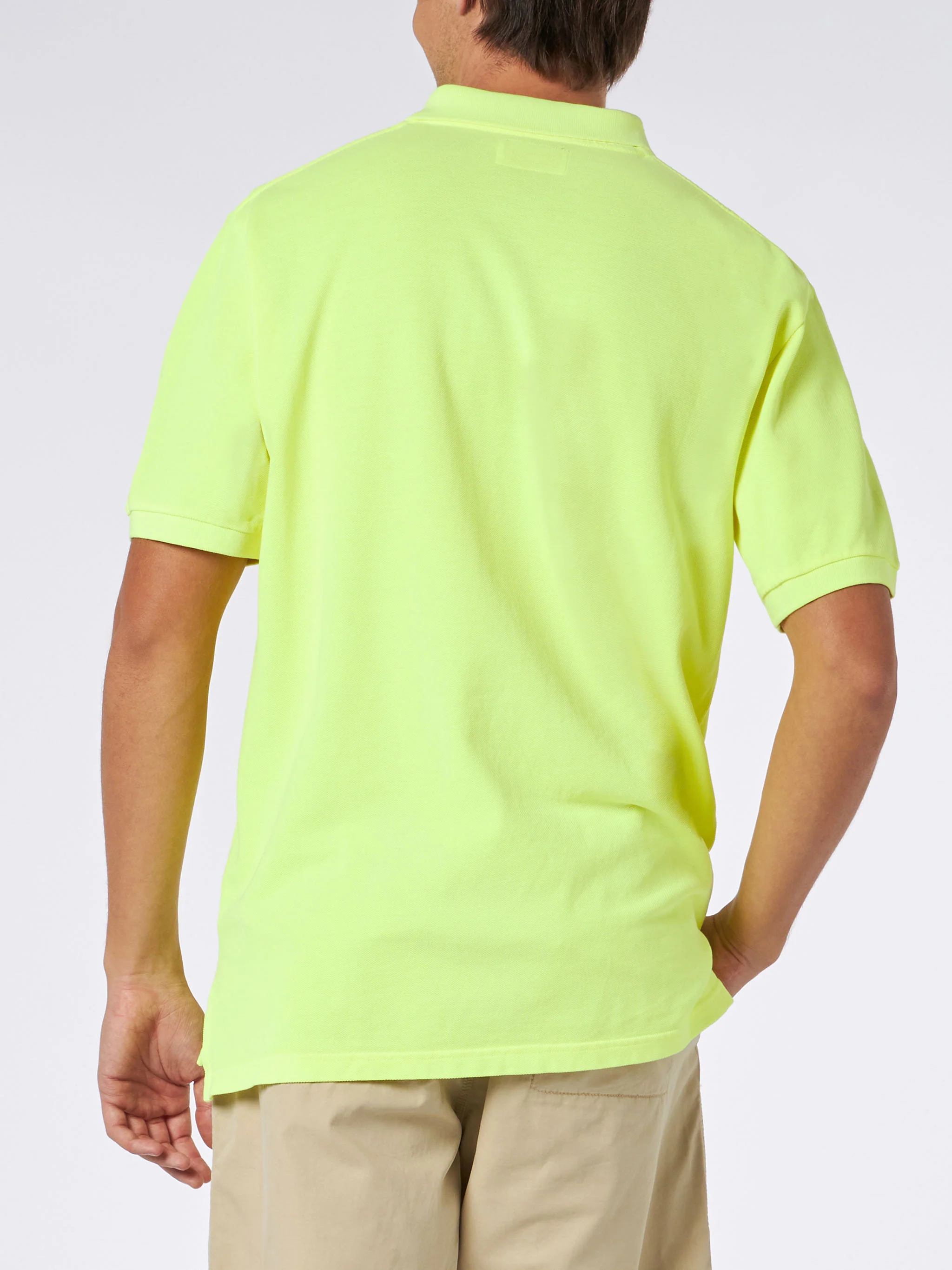Polo da uomo in piquet giallo fluo con logo St. Barth ed effetto vinta