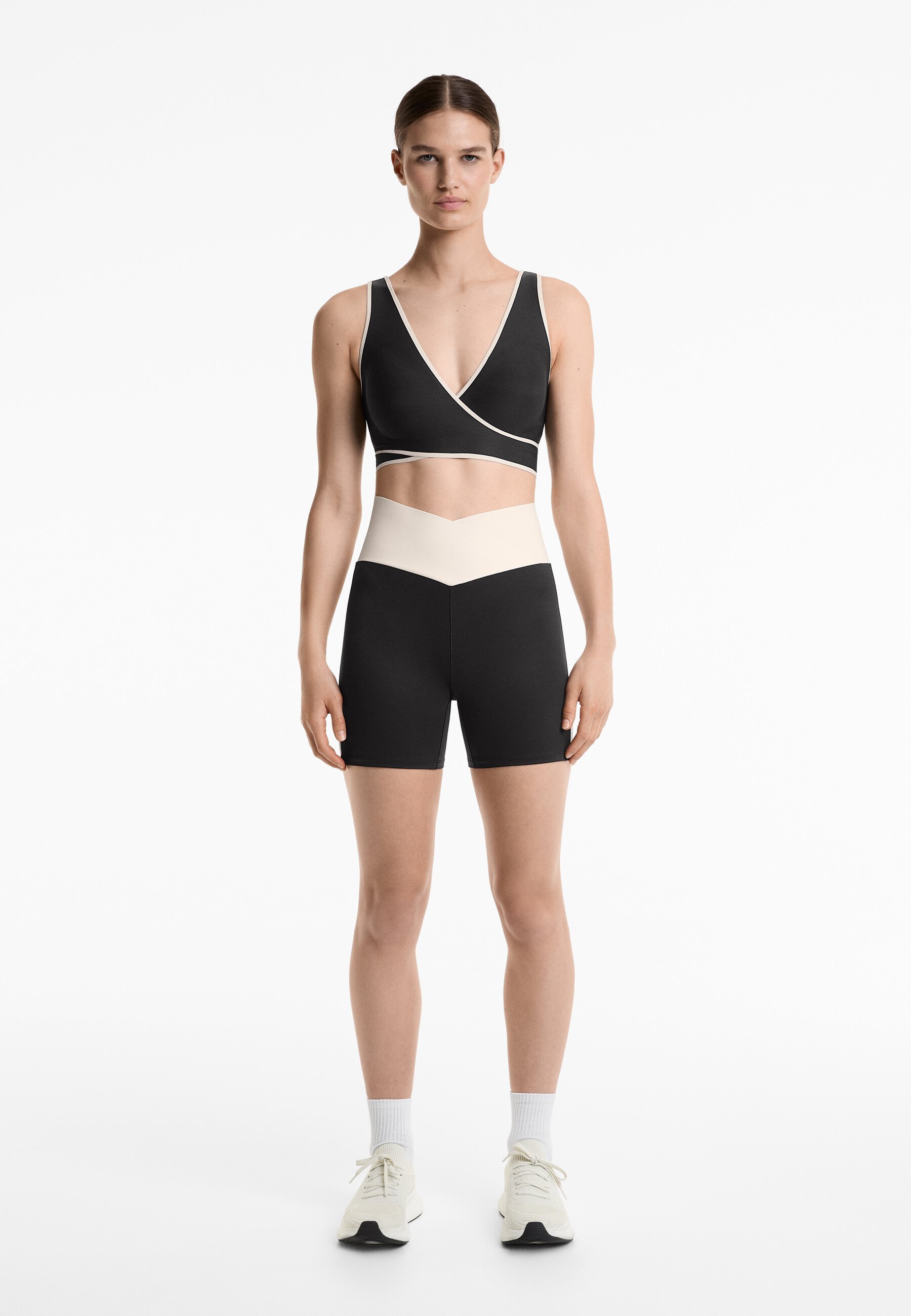 Legging taille haute OYSHO PERFECT-ADAPT 10 cm, coupe en V - Noir