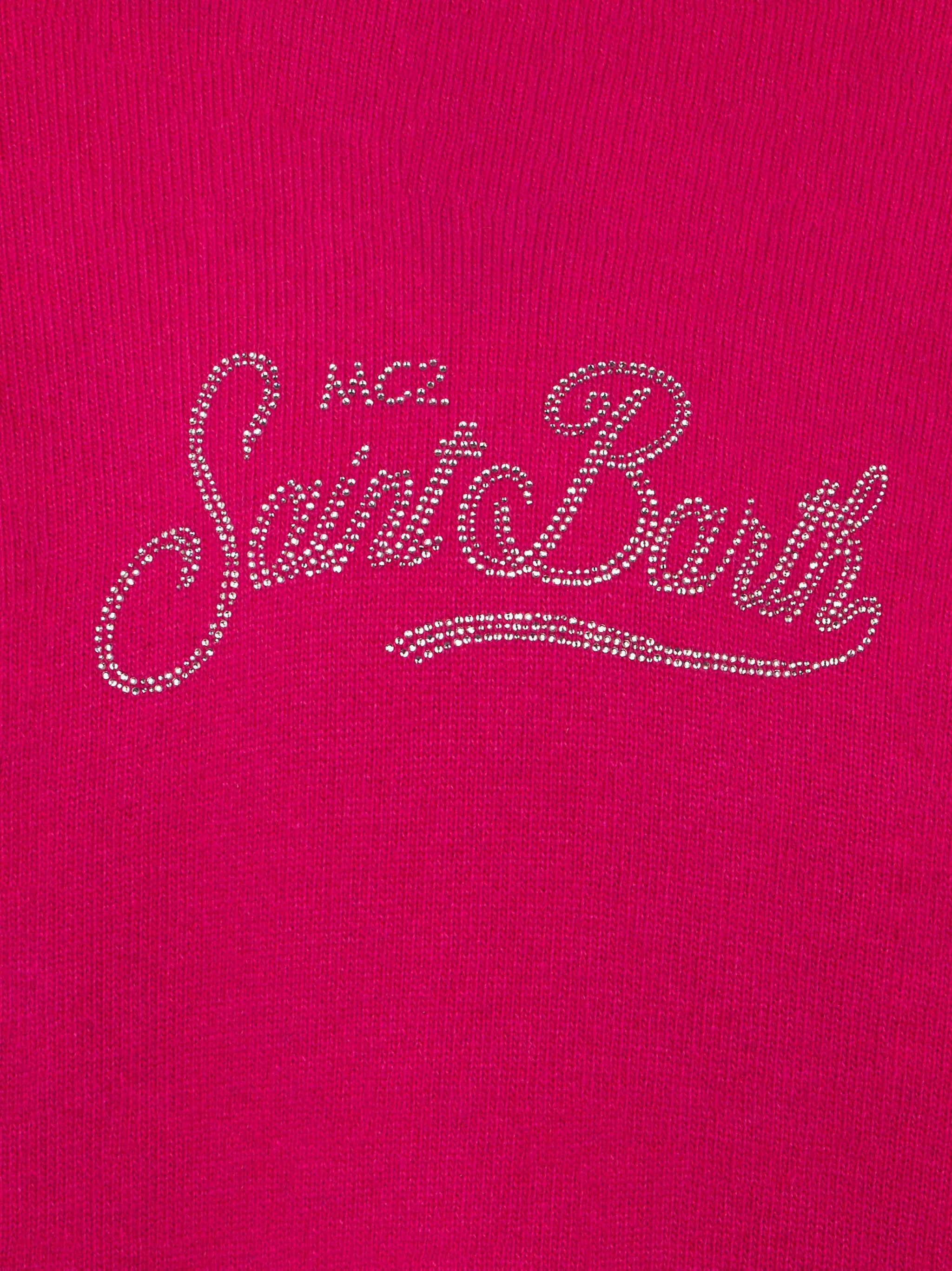 Korte fuchsia trui voor meisjes met capuchon en strass-steentjes.