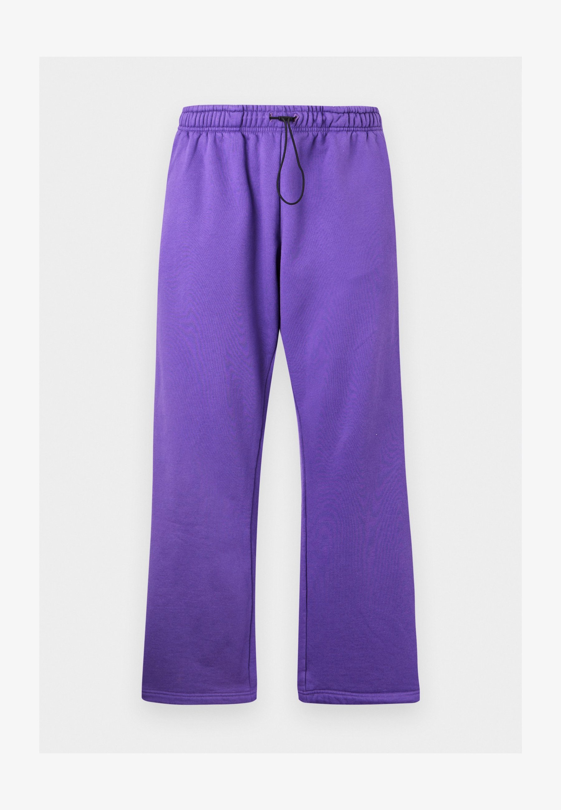 De joggingbroek van The Tracksuit Club