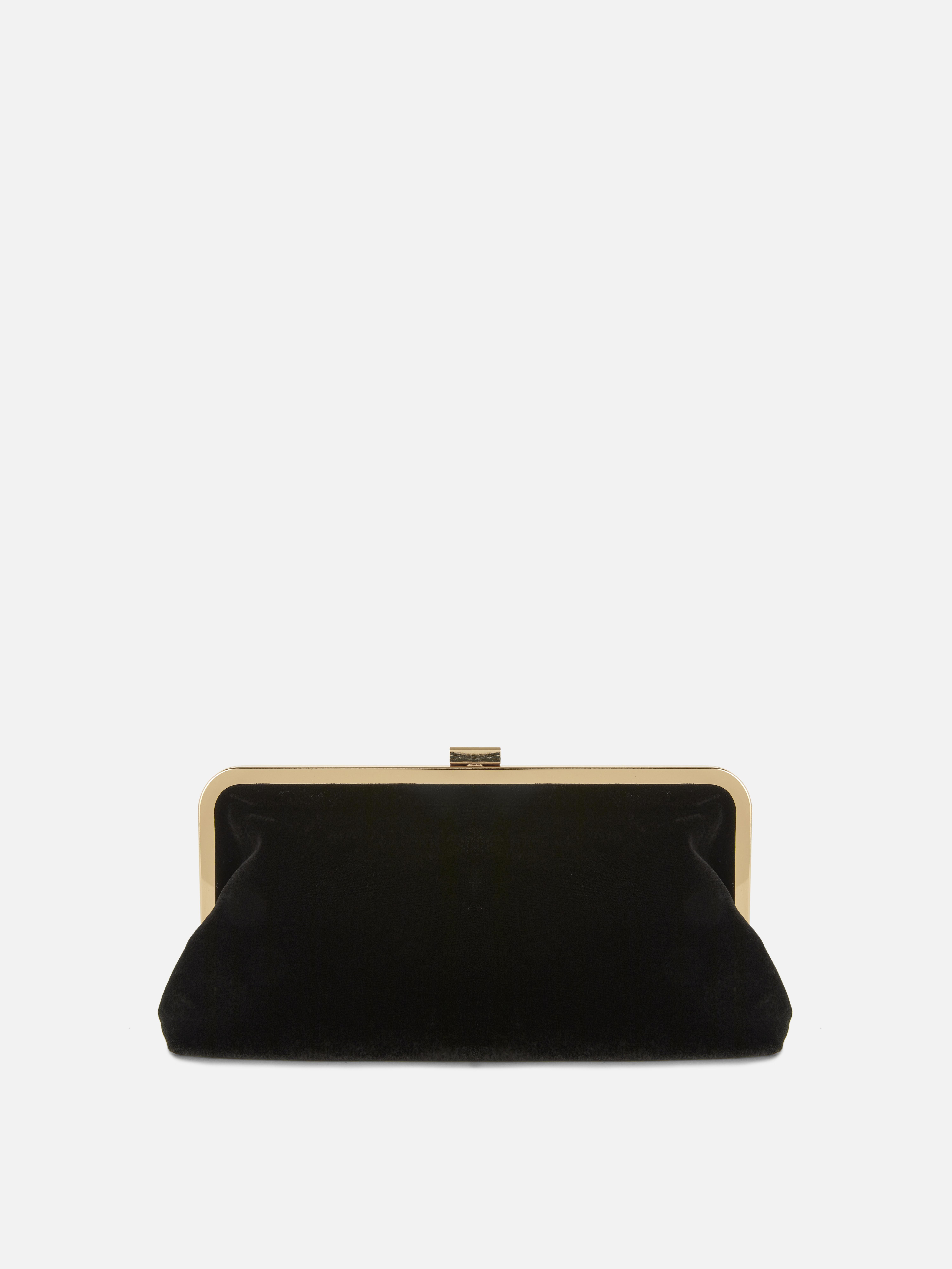 Clutch din catifea cu ramă. Acest clutch din catifea cu formă vintage completează orice ținută de seară.
