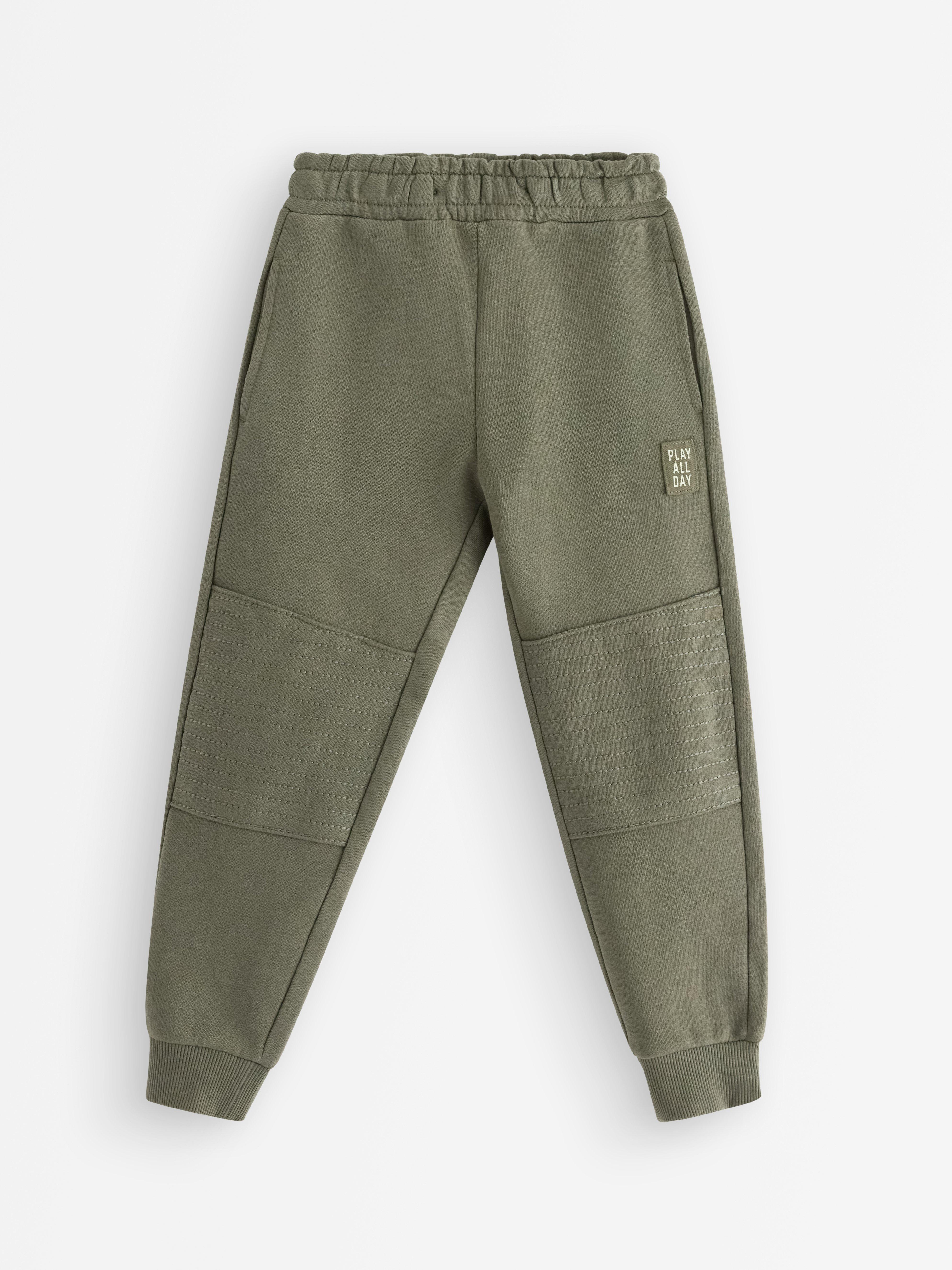 Pantalones deportivos con rodillas reforzadas