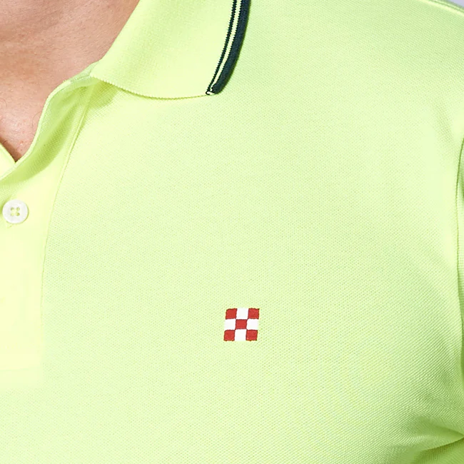 Polo in piquet giallo fluo con logo St. Barth check