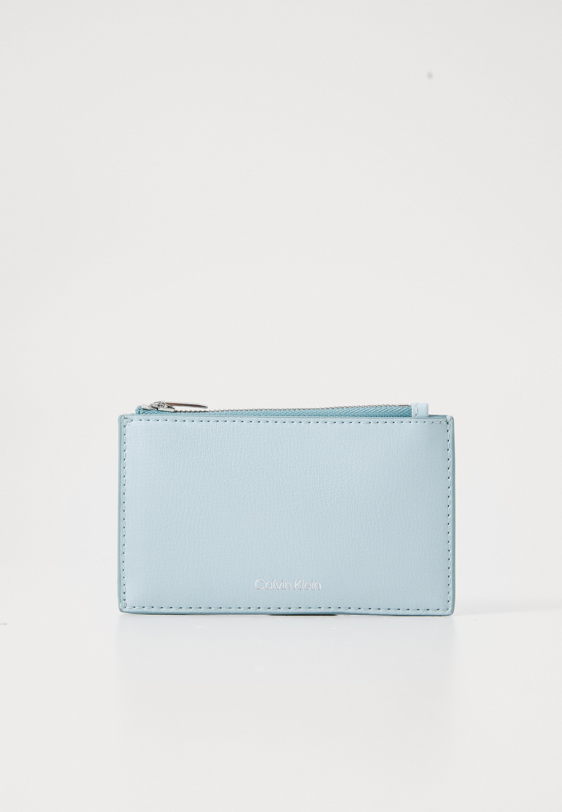 Portefeuille Calvin Klein à logo en relief - bleu très pâle/indigo vintage