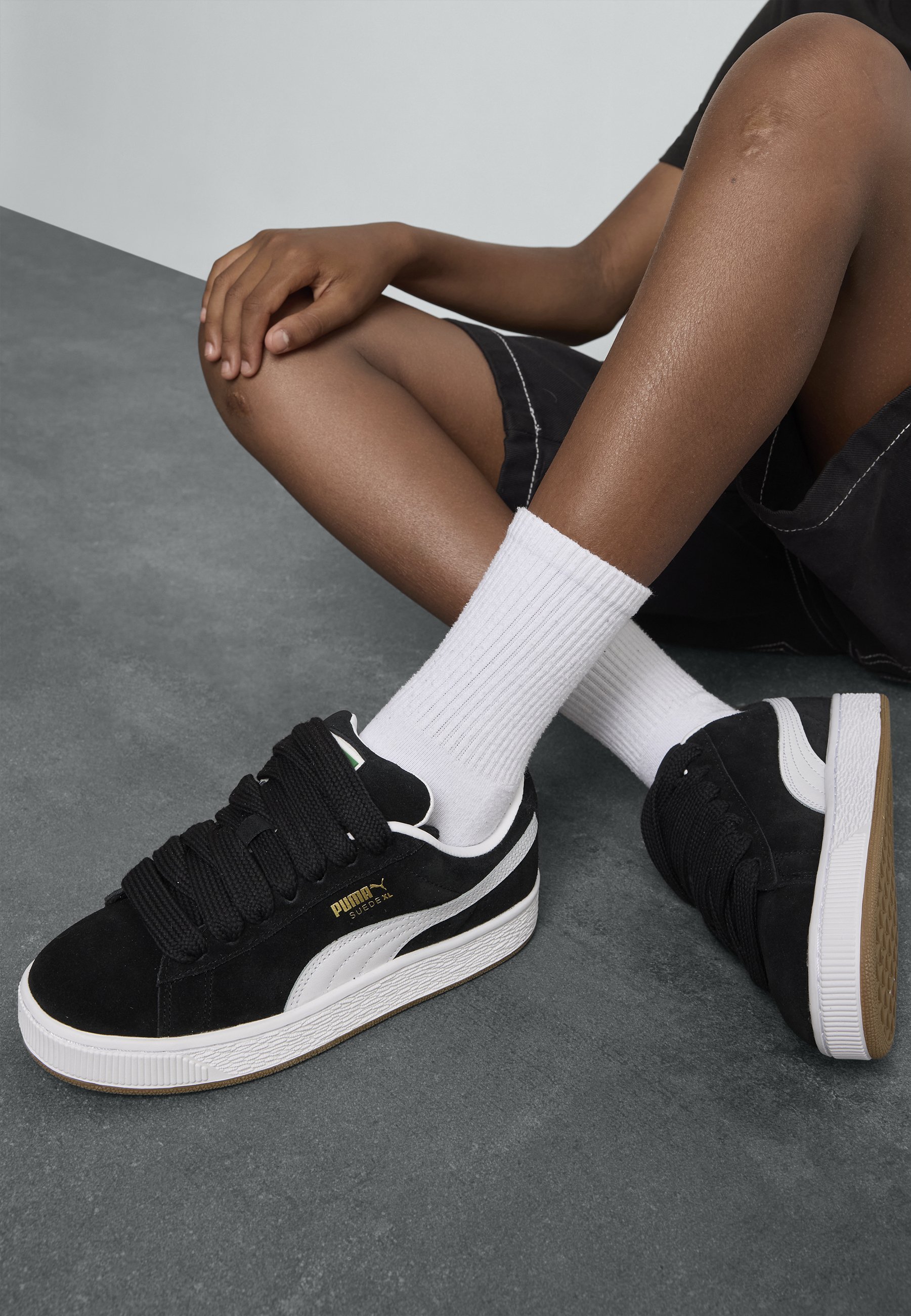 Baskets Puma unisexes - noir/blanc