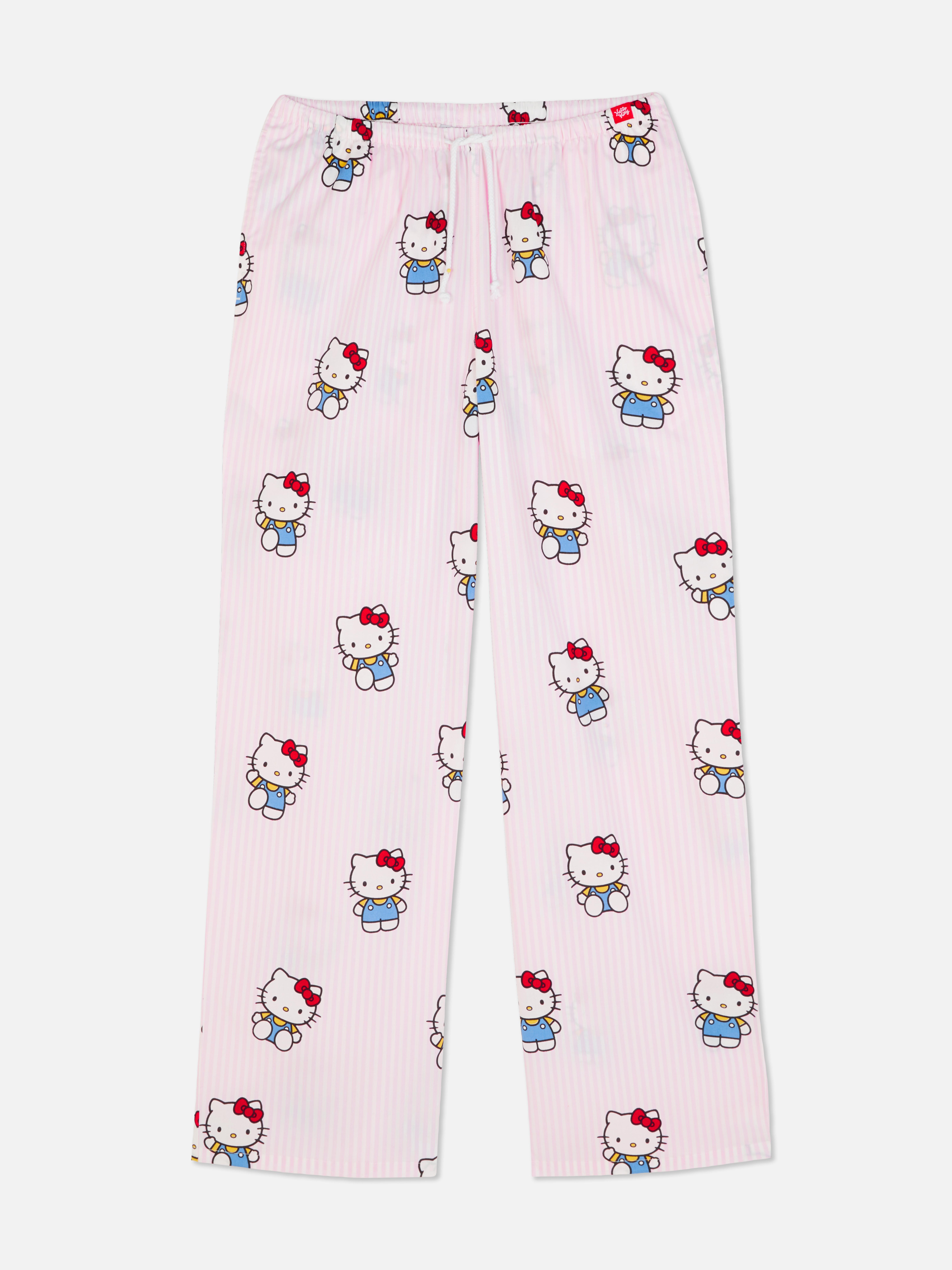 Pantaloni de pijama Hello Kitty și prietenii. Pantaloni de pijama cu șnur, buzunare laterale și personaje Hello Kitty.