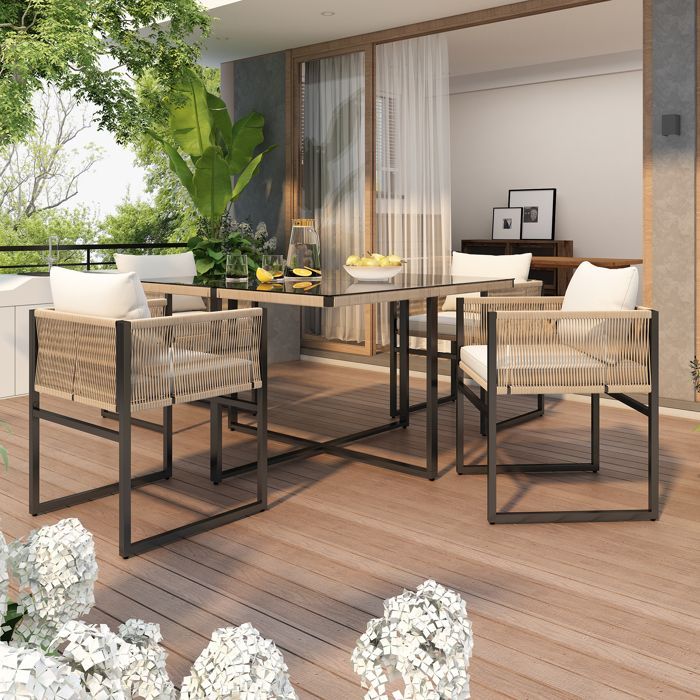 Conjunto de comedor de jardín de 5 piezas: mesa de 110x110x74 cm y sillas apilables.