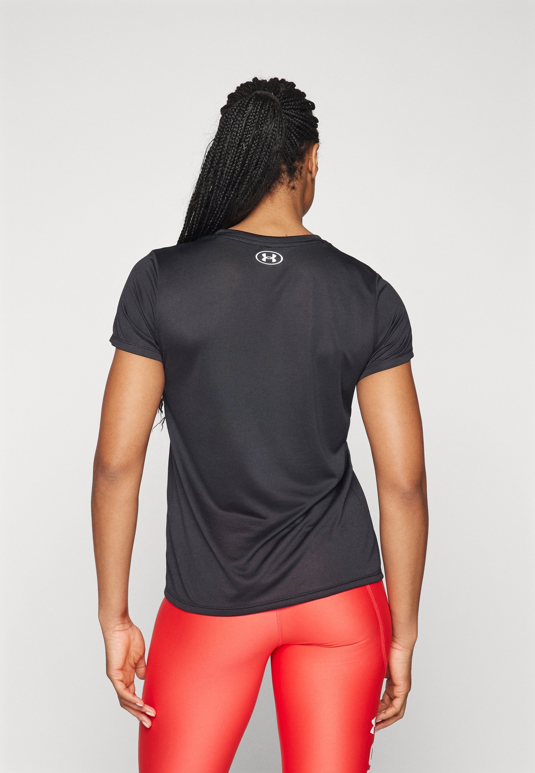 Under Armour SOLID - Sport T-shirt - zwart/wit