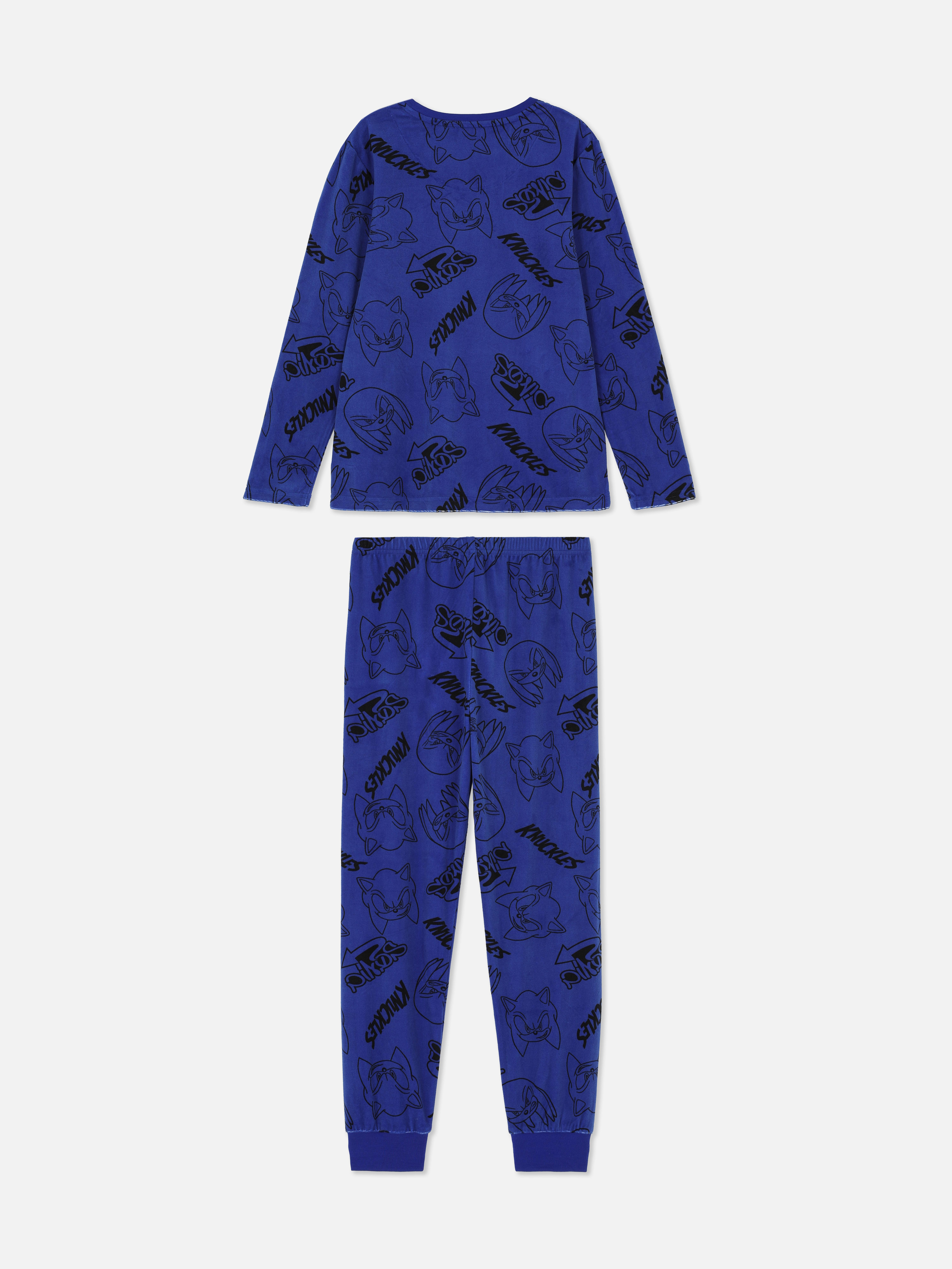 Tricou și pantaloni de pijama cu Sonic Ariciul. Micul tău jucător se grăbește spre confortul de seară în aceste pijamale cu Sonic.