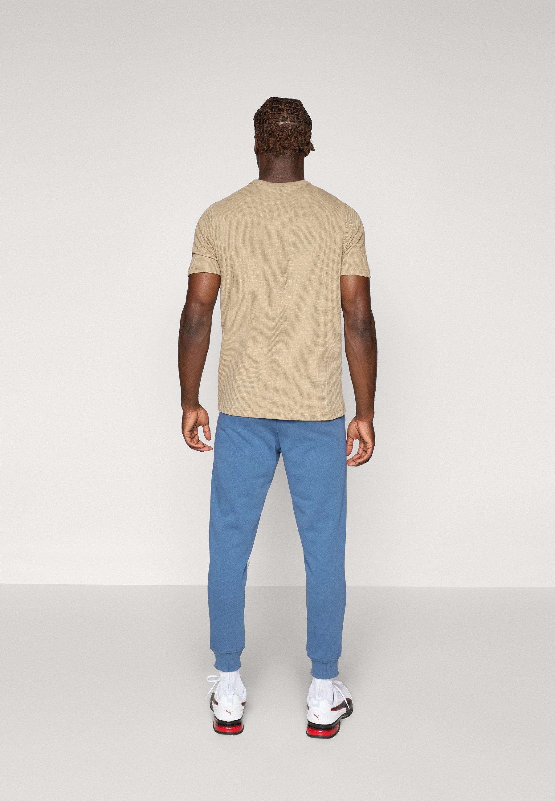 Puma ESSENTIALS FRENCH JOGGER - Trainingsbroek - donker indigo
