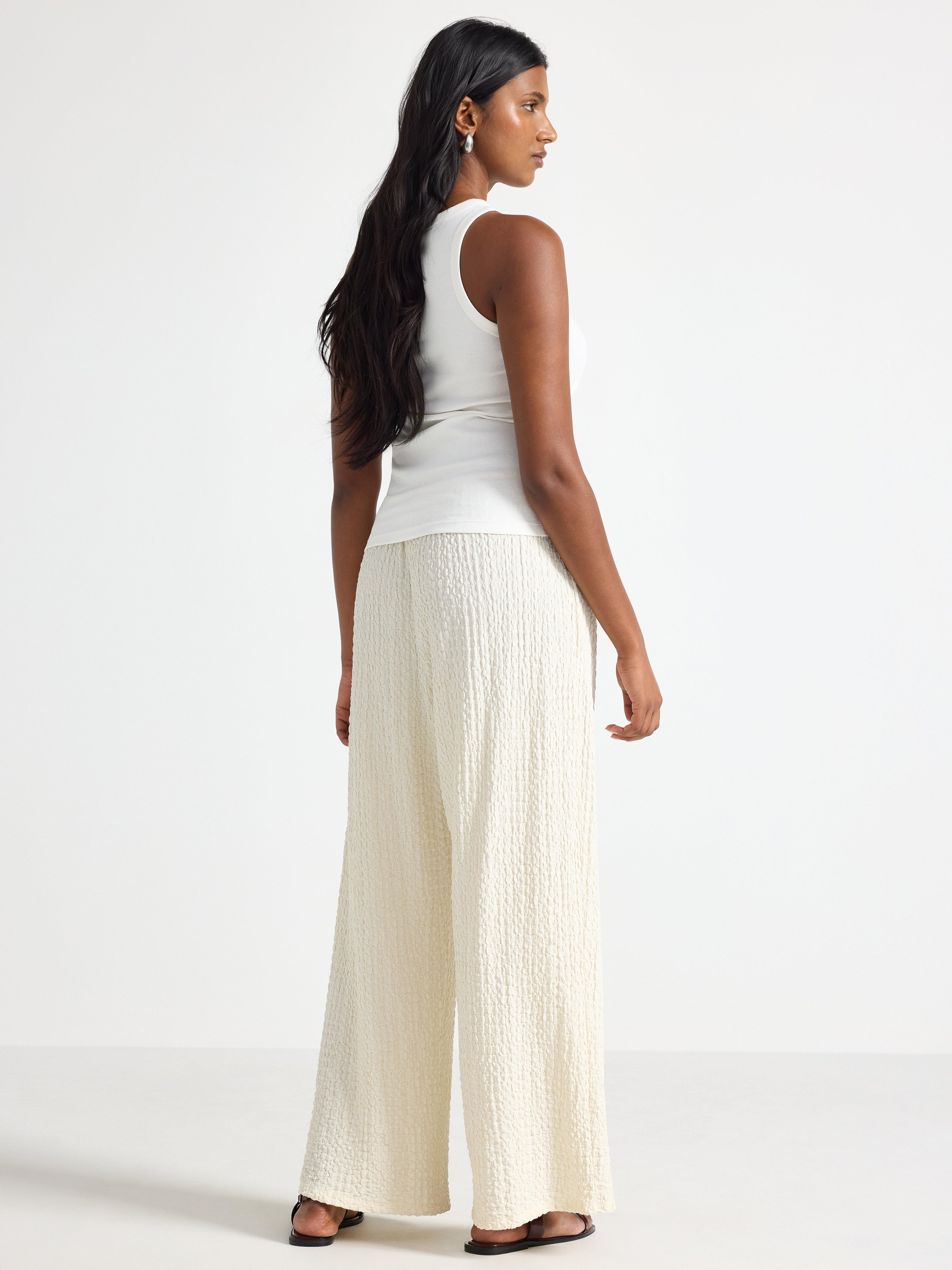 Pantalon en jersey texturé blanc cassé