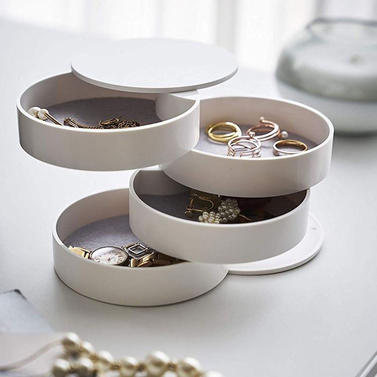 Boîte à bijoux/organisateur rotatif UNIQ Beauty Case à 4 niveaux – 1 pièce