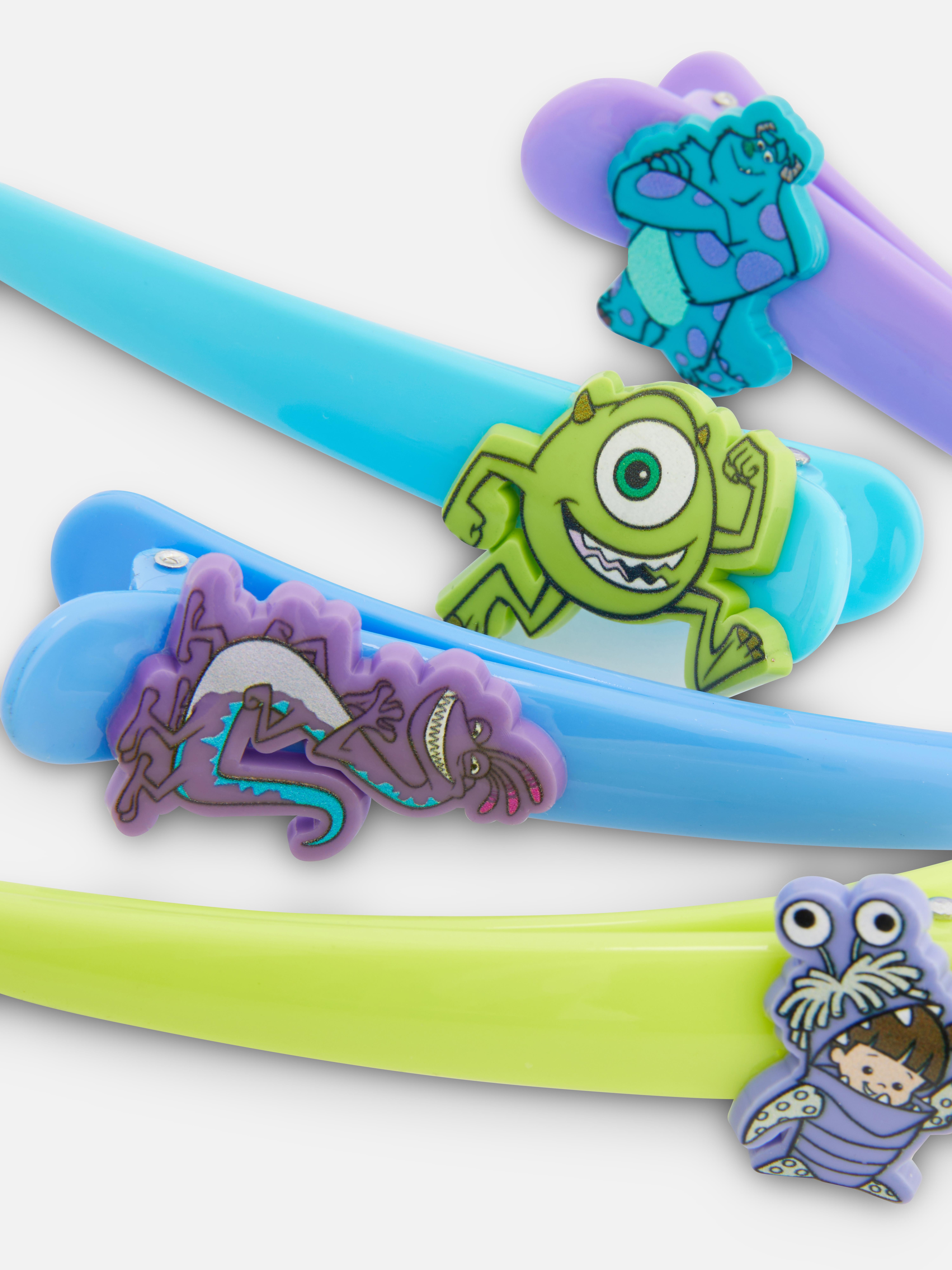 Agrafe de păr alungite Disney, set de 4. Patru agrafe de păr colorate cu diverse personaje din filmul Monsters, Inc. de la Disney.