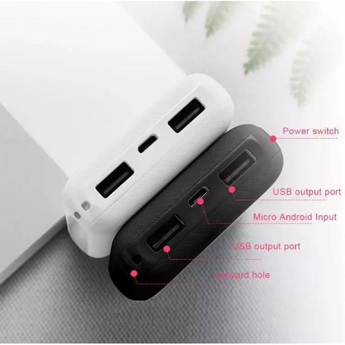 Batería externa de 5000 mAh con carga rápida y 2 puertos USB, color blanco.