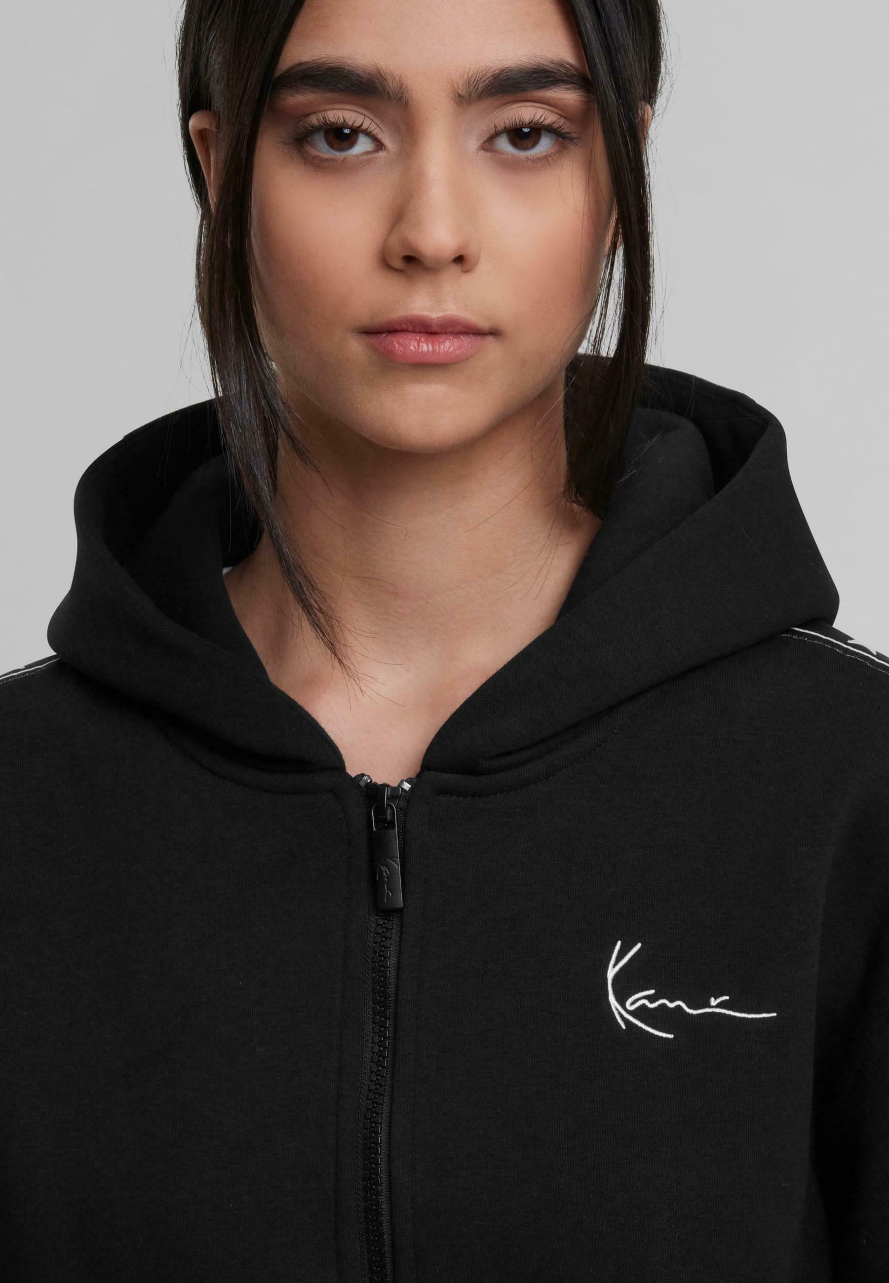 Felpa con zip Karl Kani SIGNATURE - nera