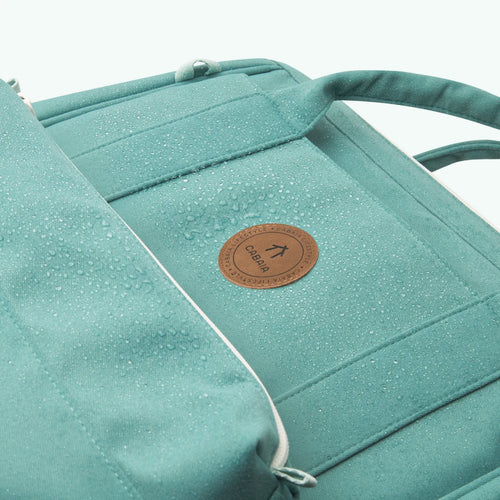 Cabaia Alta grüne Wickeltasche
