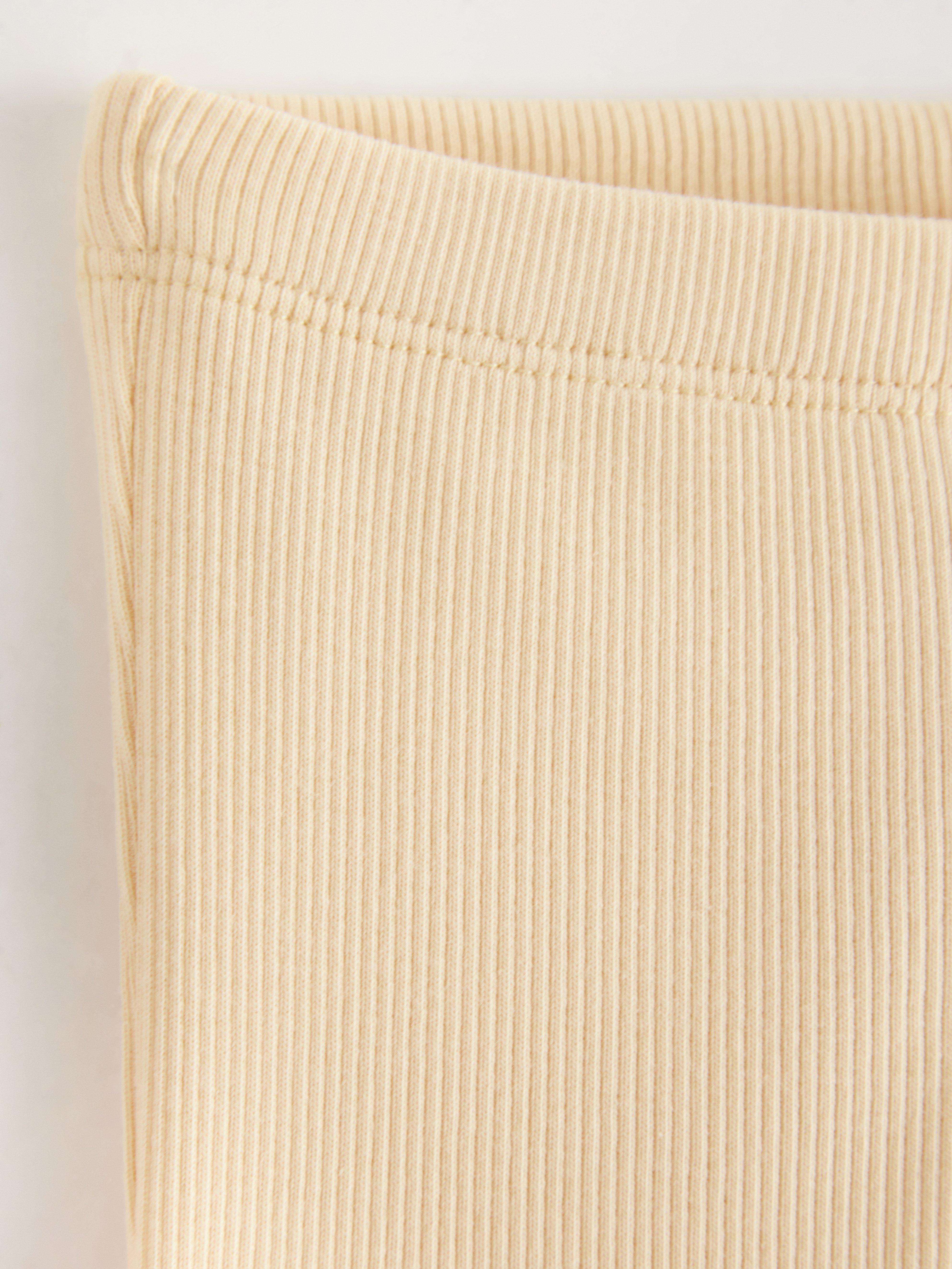 Leggings acanalados color amarillo claro empolvado