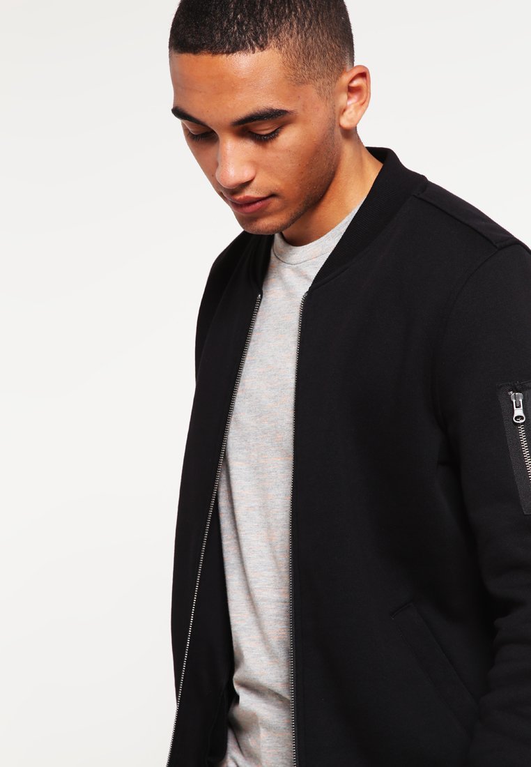Urban Classics JAKNA BOMBER - Pulover z zadrgo - črna