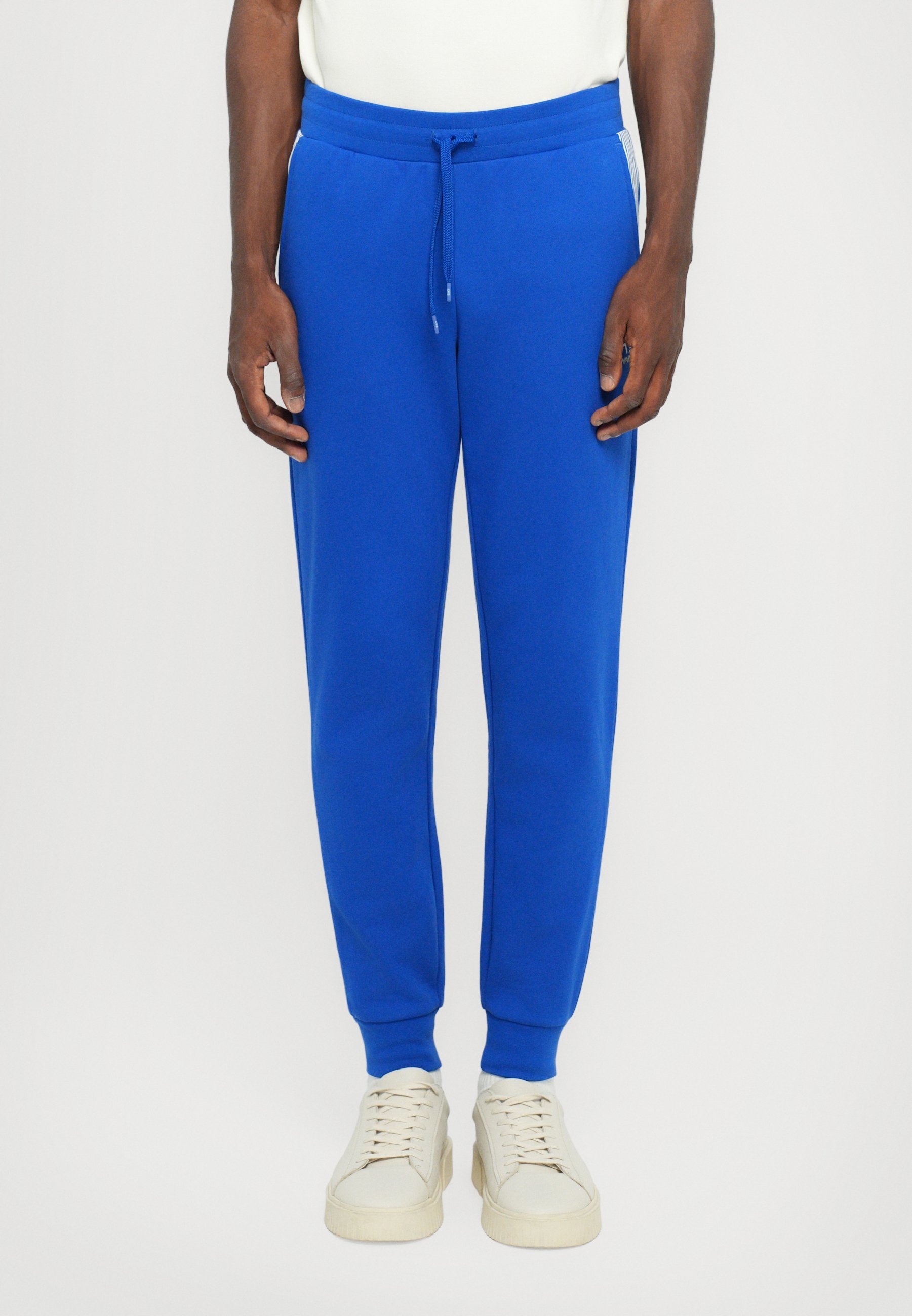 EA7 Emporio Armani TRAIN LINES NOHAVICE - Teplákové nohavice - surfujte po webe