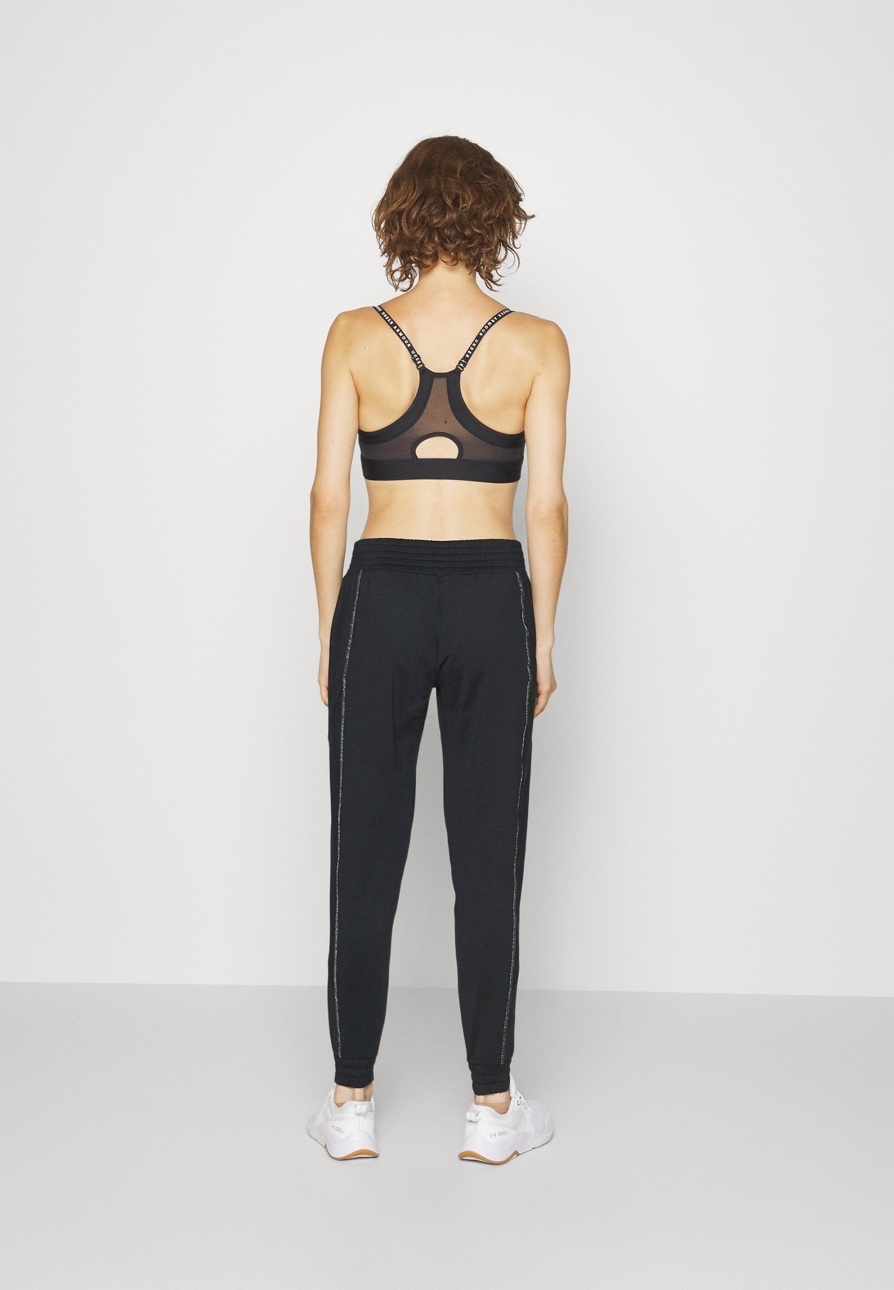 Pantaloni della tuta Under Armour - neri