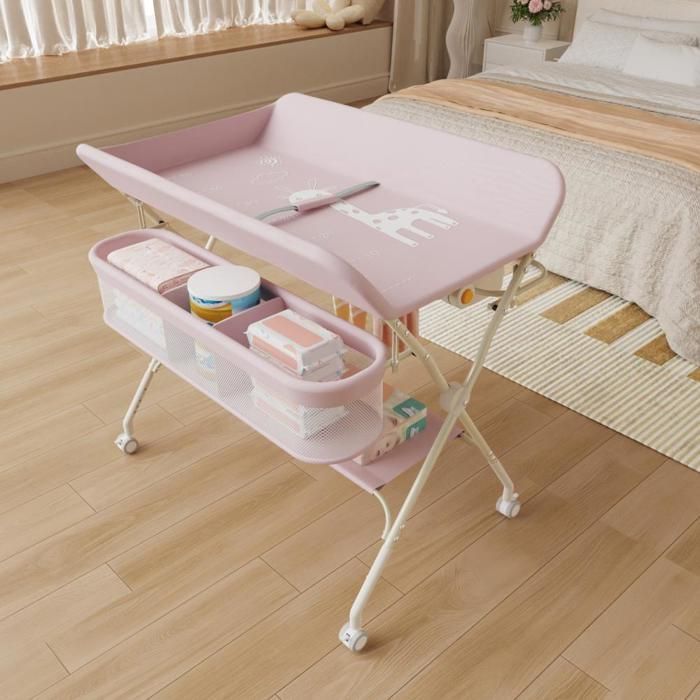 Cambiador plegable y portátil MIPAN - Con cesta de almacenamiento + 4 ruedas + cinturón de seguridad - Altura regulable - Rosa