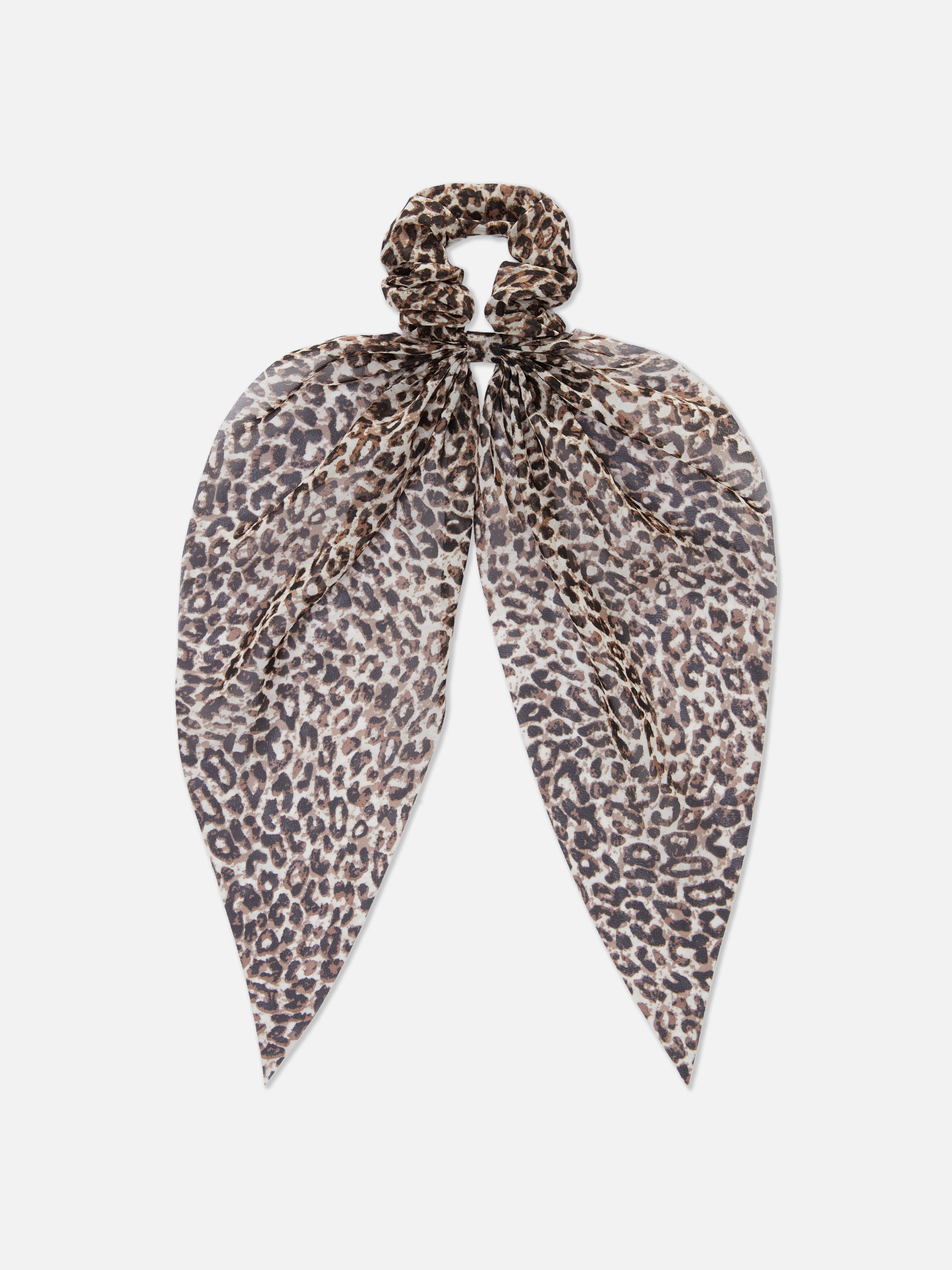Elastic lung cu imprimeu leopard Dezlănțuie-te cu acest elastic lung cu imprimeu leopard