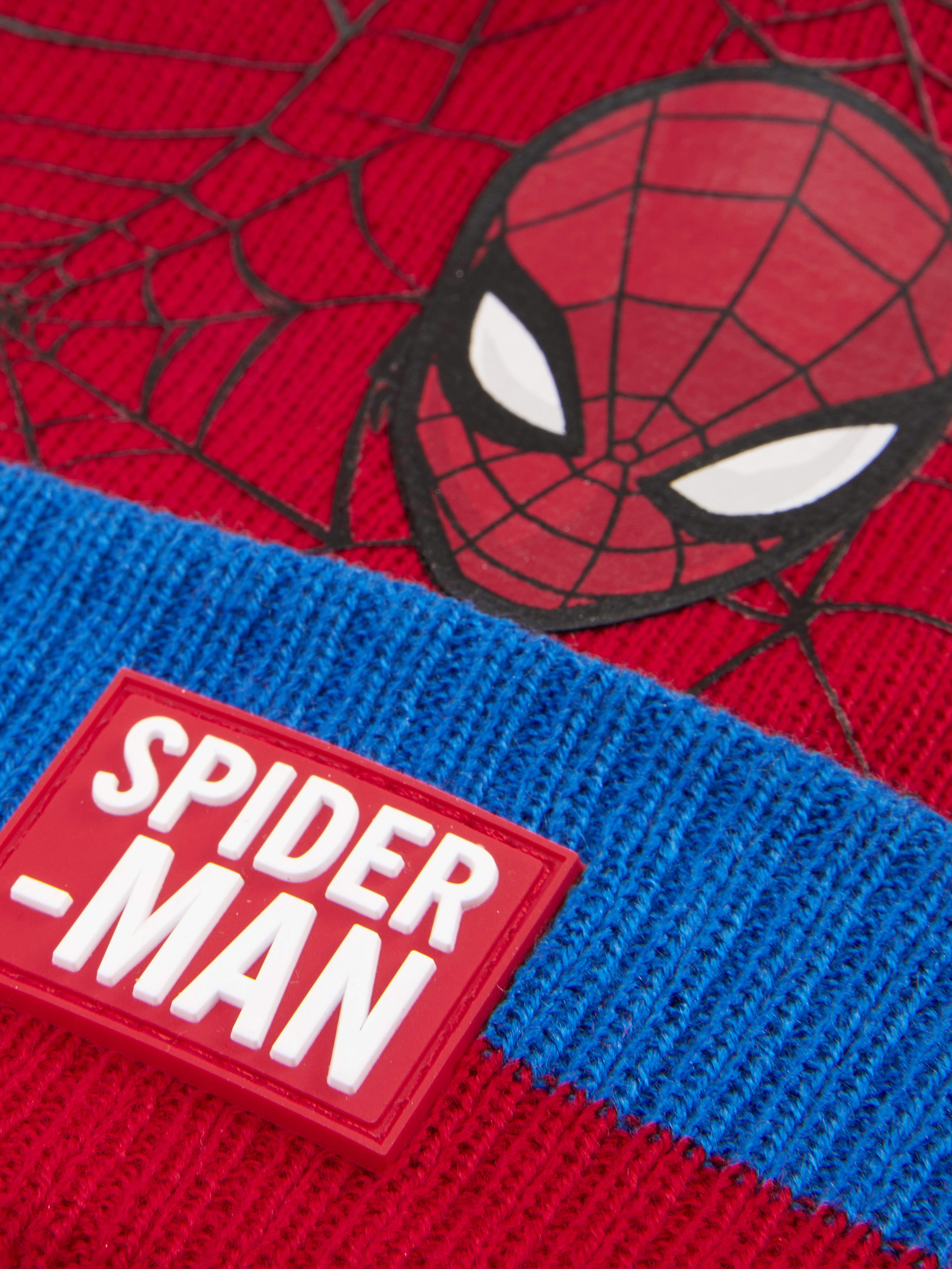 Căciulă MARVEL Spider-Man cu pompoane O căciulă în culorile lui Spider-Man de la Marvel, cu motiv de pânză și pompon în partea de sus