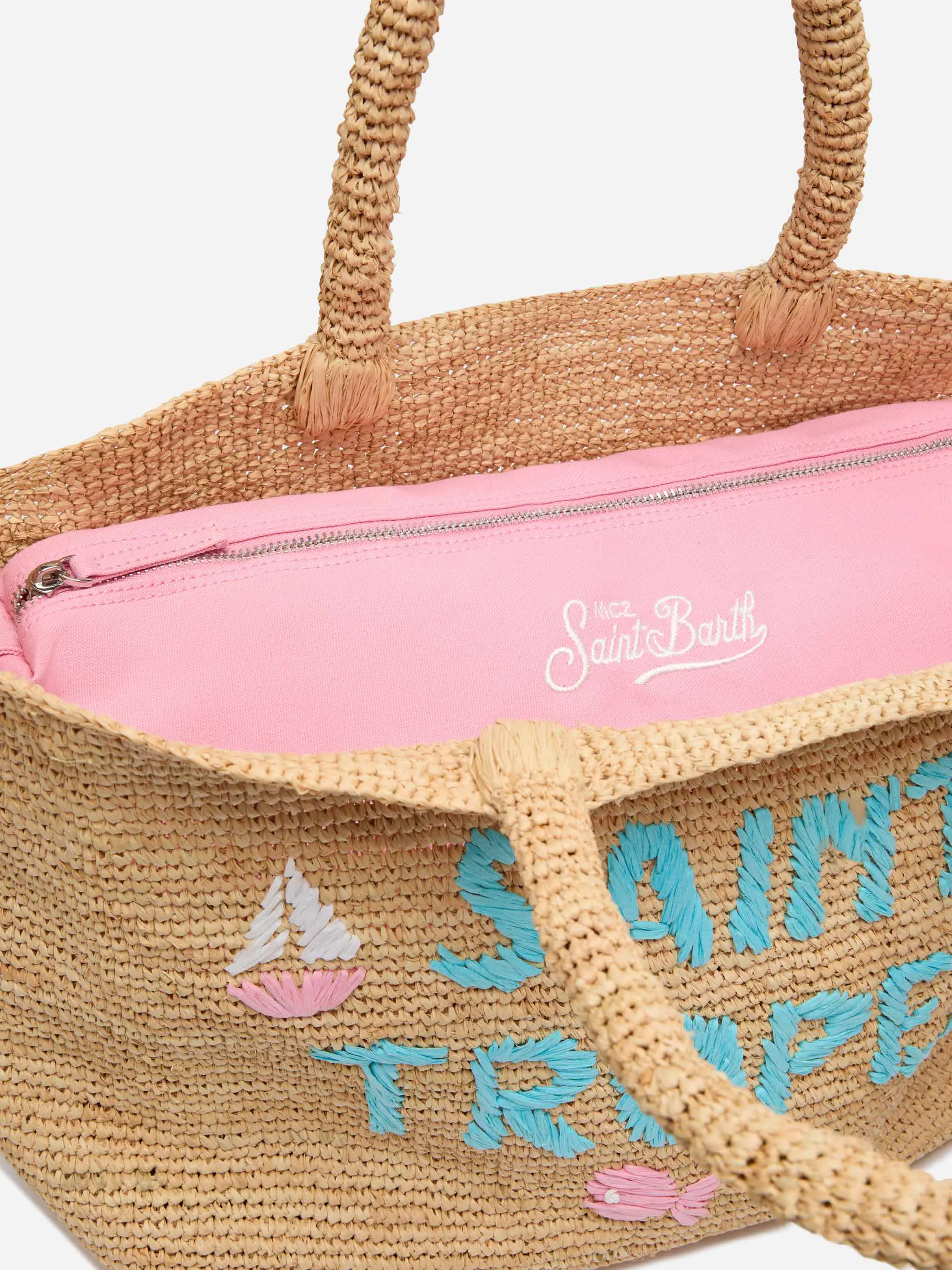 Beige raffia strandtas met katoenen binnenvak en St. Trop-borduurwerk.
