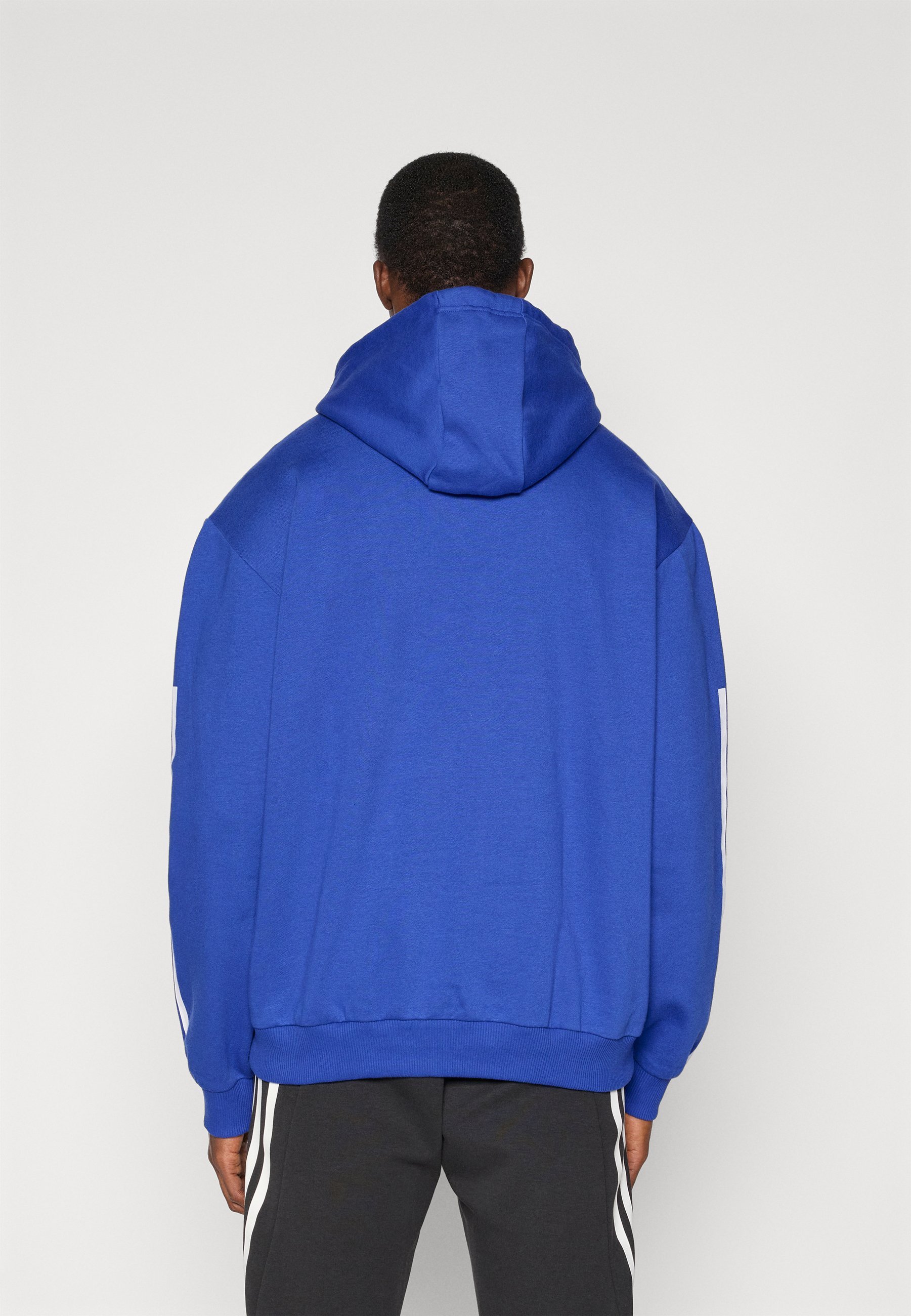 adidas Sportswear TIRO - Sweat à capuche - bleu semi-transparent
