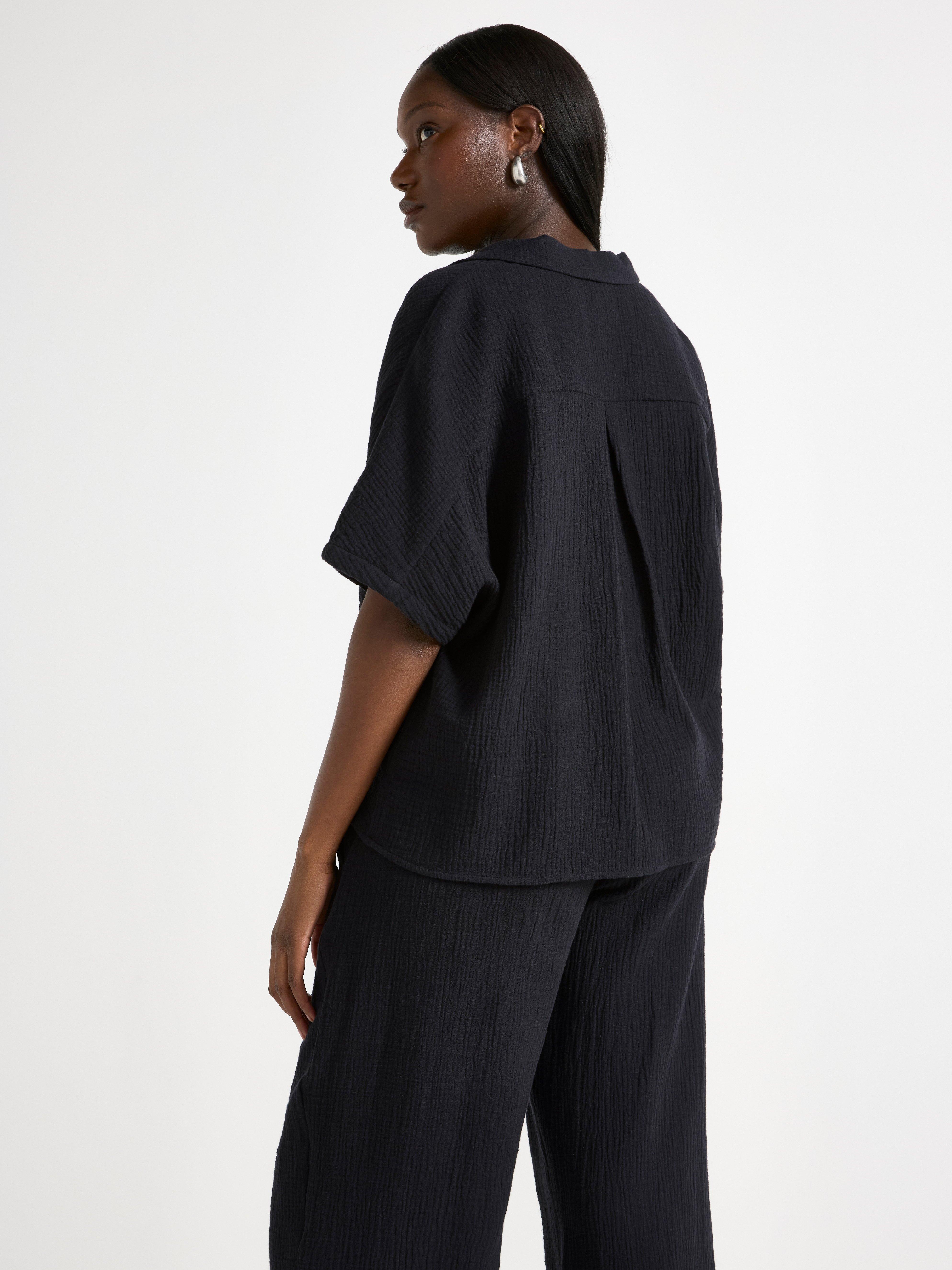 Camisa arrugada de mamá negra