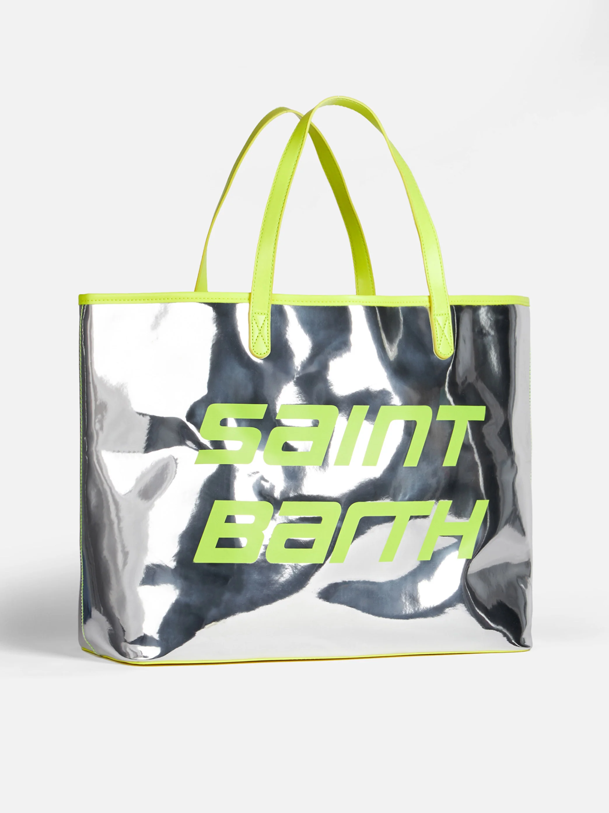 Zilverkleurige reflecterende tas met fluorescerend gele details.
