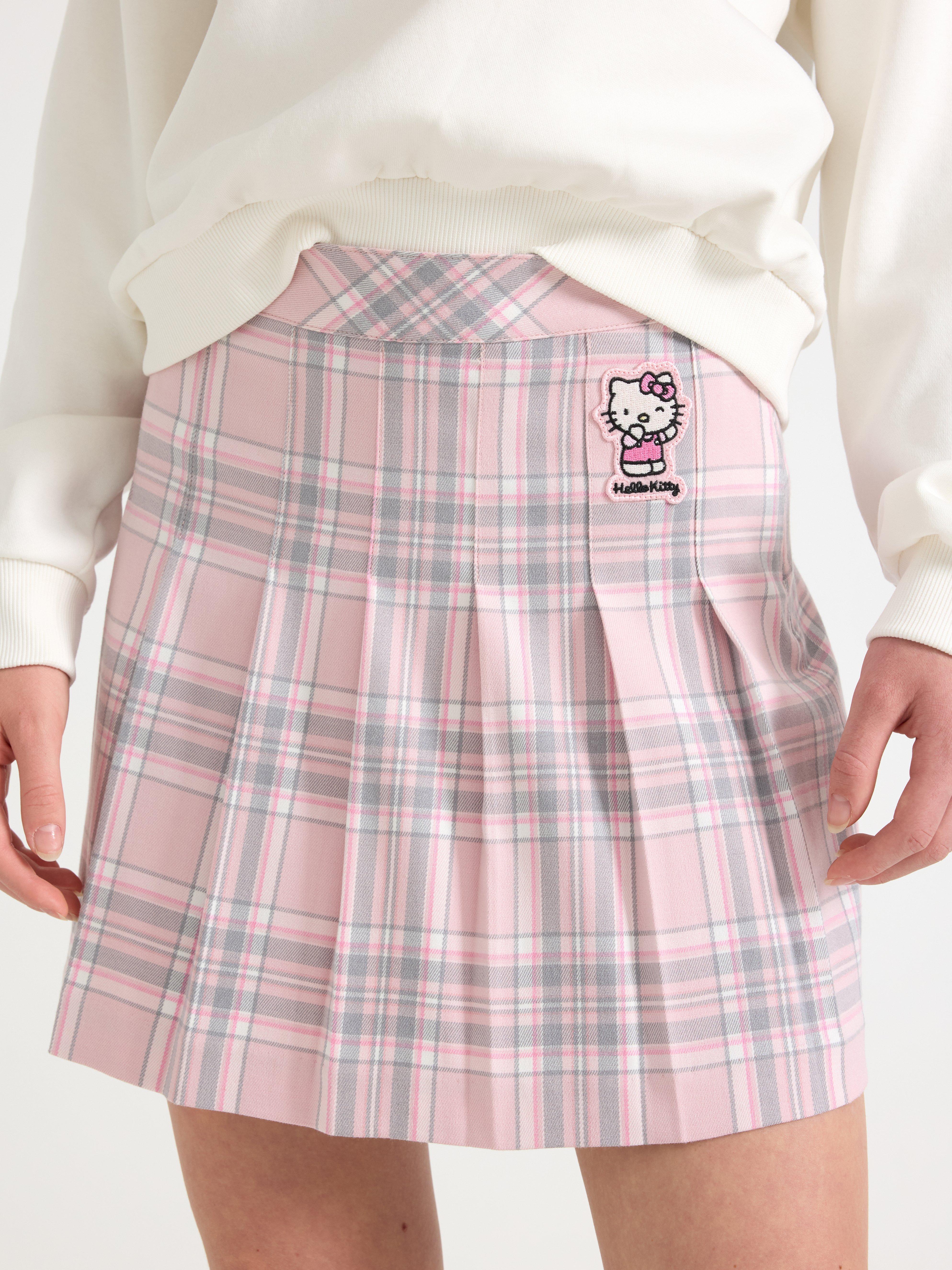 Saia plissada Hello Kitty rosa claro