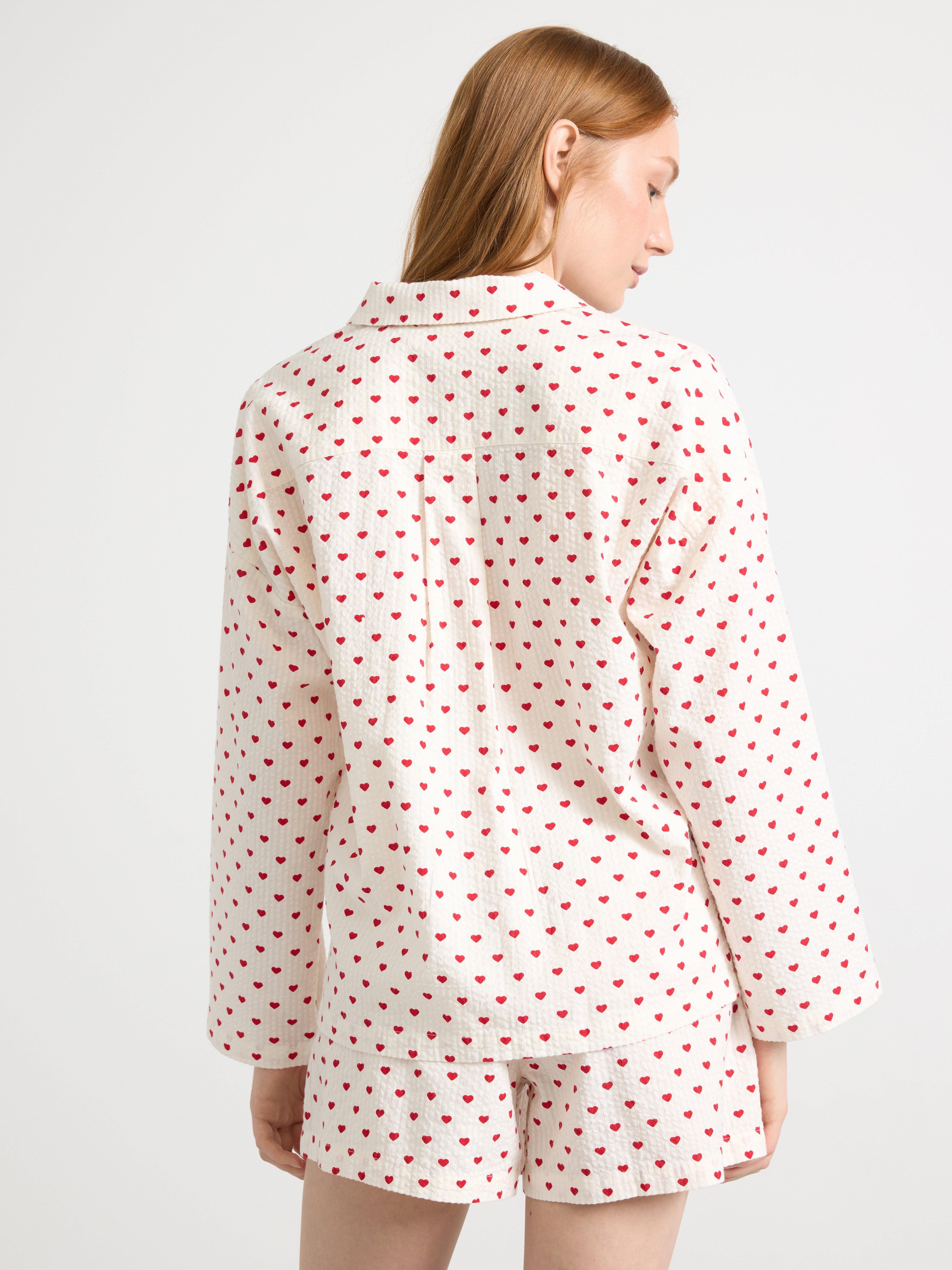 Camisola vermelha com estampa de ondas de riacho