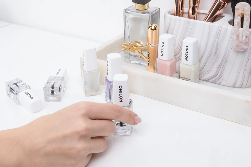 Esmalte base fortalecedor para unhas Notino Nail Care com vitaminas A, C e E.