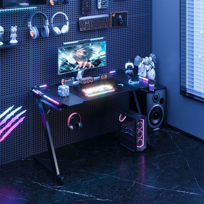 Escritorio para juegos HOMALL con iluminación LED, 120 × 60 cm, controlador táctil USB, escritorio ergonómico para juegos de ordenador, color negro.