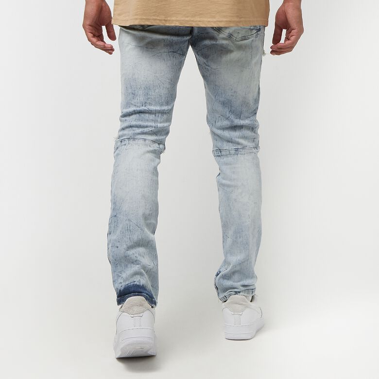 Gebleichte, gerissene und reparierte Jeans
