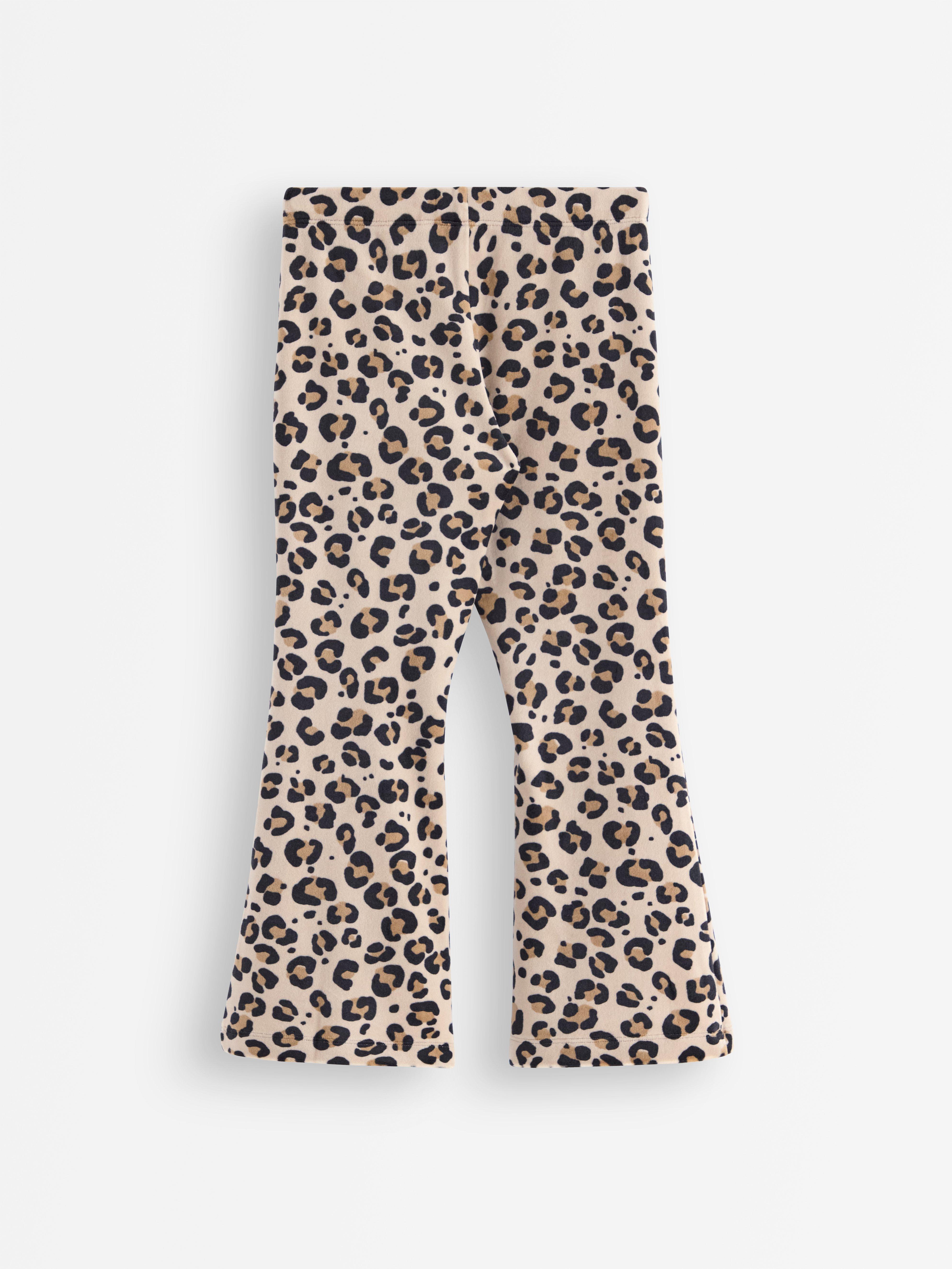 Calças legging flare em veludo bege
