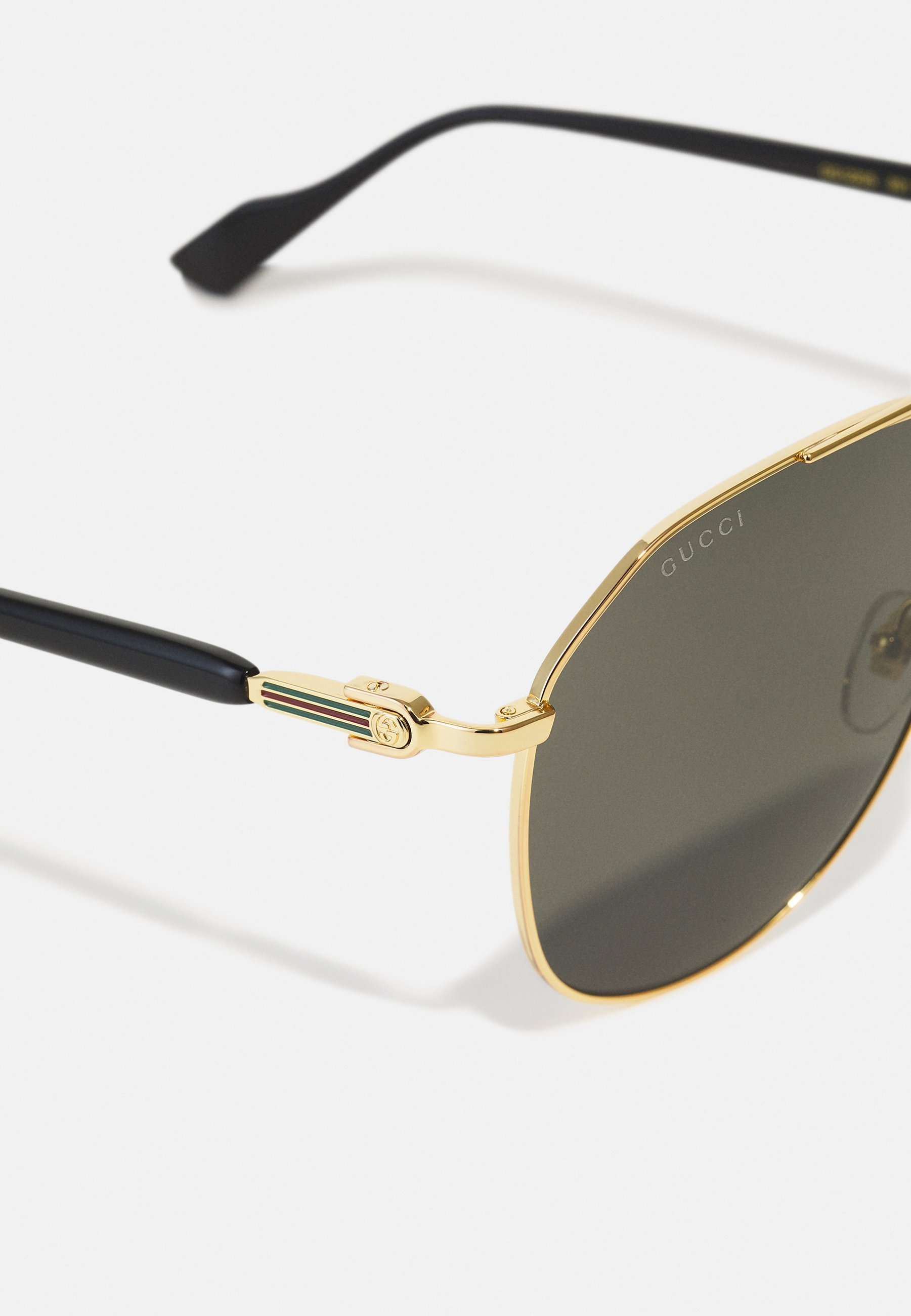 Gucci zonnebril - goud/grijs