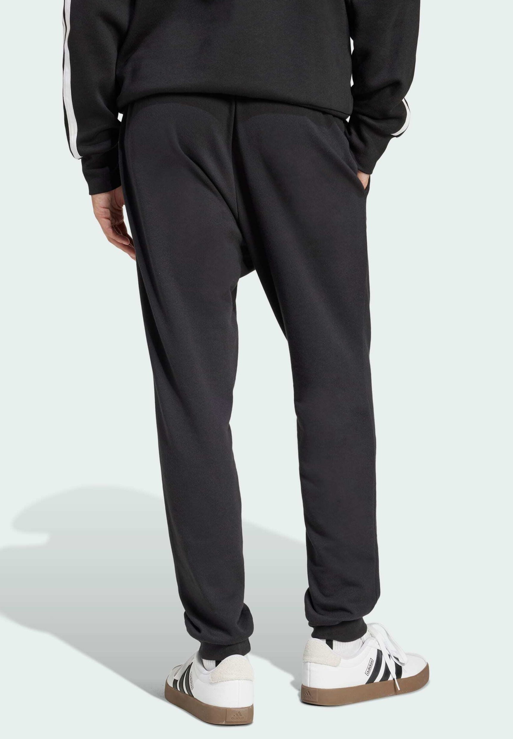 adidas Sportswear ESSENTIALS FEEL COMZY - Trainingsbroek - zwart wit