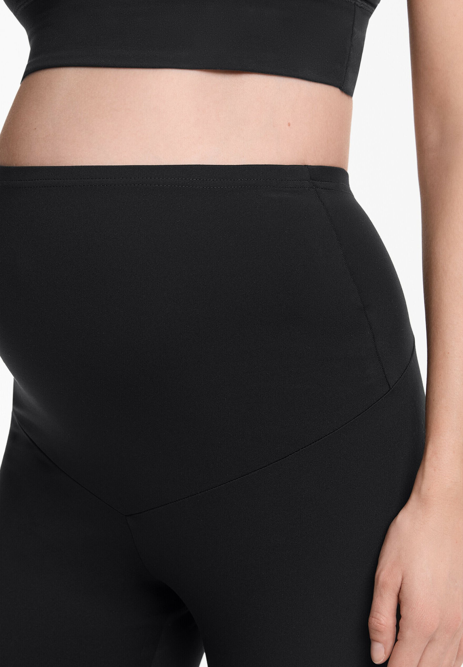 OYSHO COMFORTLUX 40 cm CAPRI DE MATERNITÉ - Pantalon de sport 3/4 - Noir