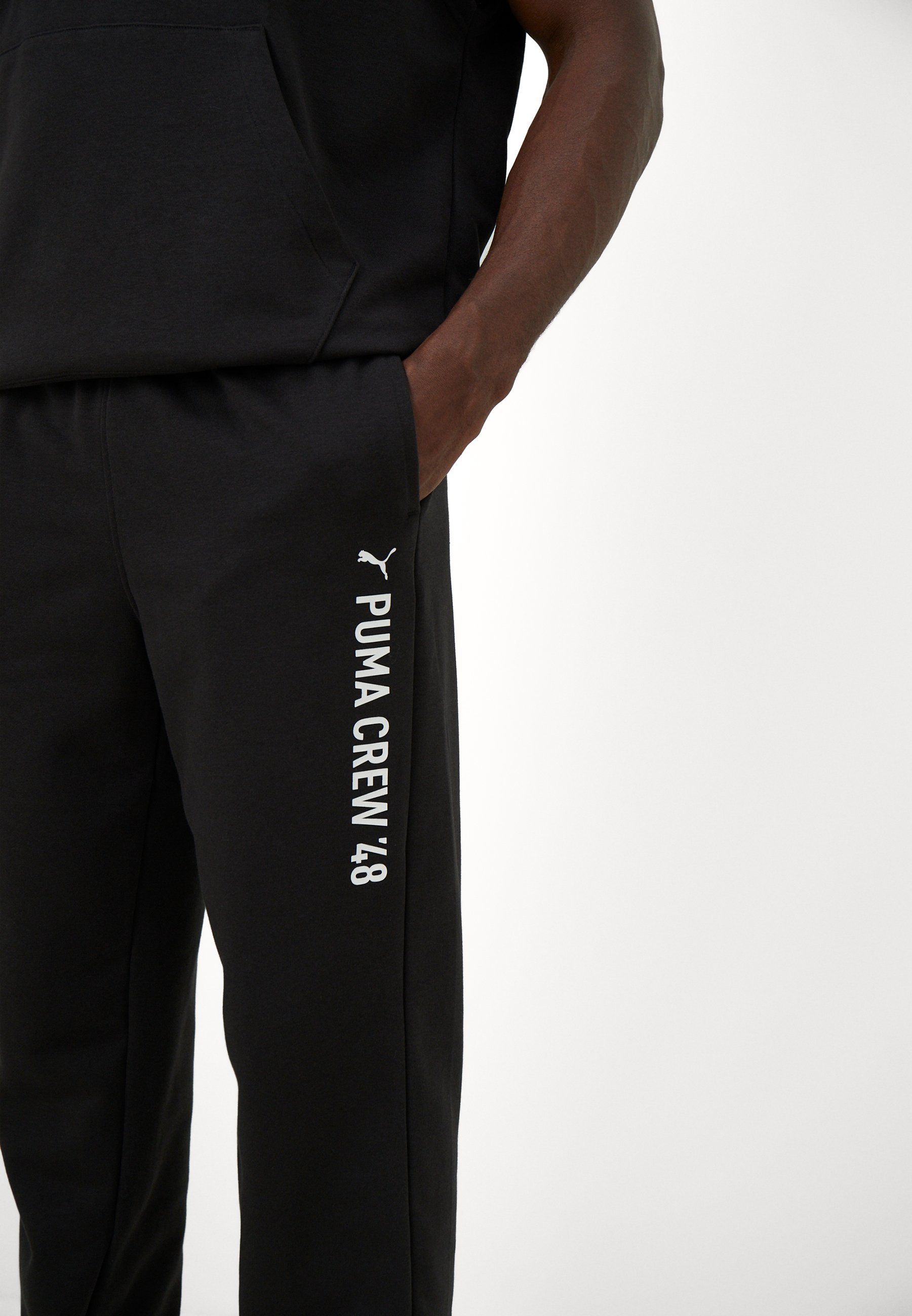 Puma GRAPHIC JOGGER - Trainingshose - schwarz
