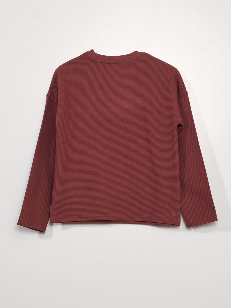 Camiseta texturizada com bolso canguru - VERMELHA