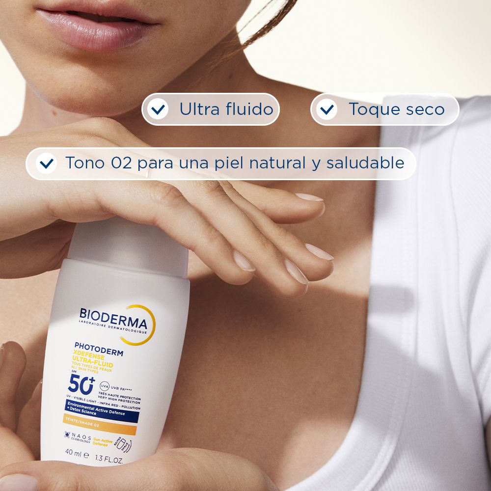 Photoderm XDefense Ultra-Fluid SPF 50 obarvana krema za sončenje, odtenek 02 Zaščita pred soncem iz lekarne