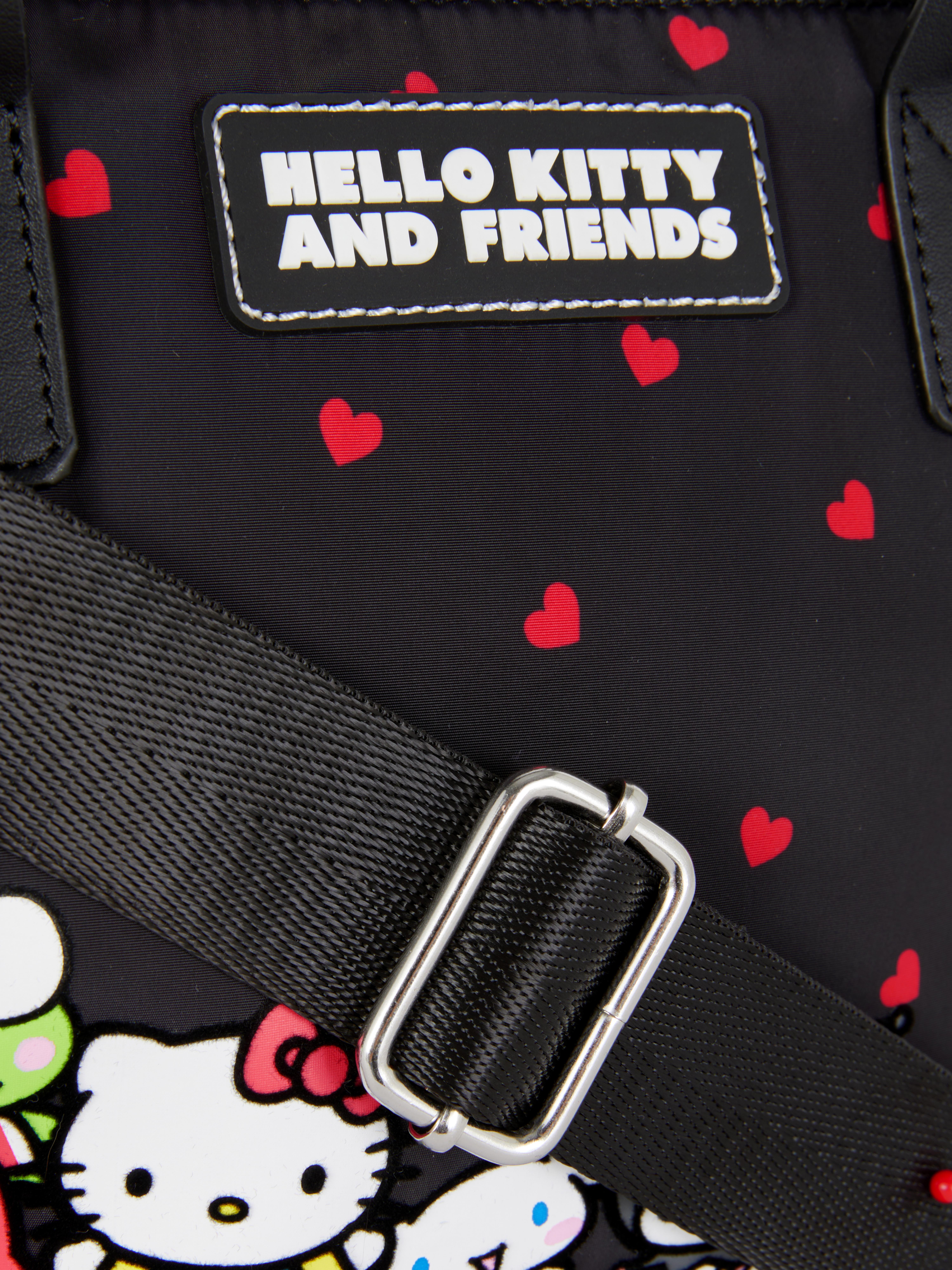 Hello Kitty und Freunde Schultertasche Eine Hello Kitty und Freunde Schultertasche mit Tragegriffen und Reißverschluss