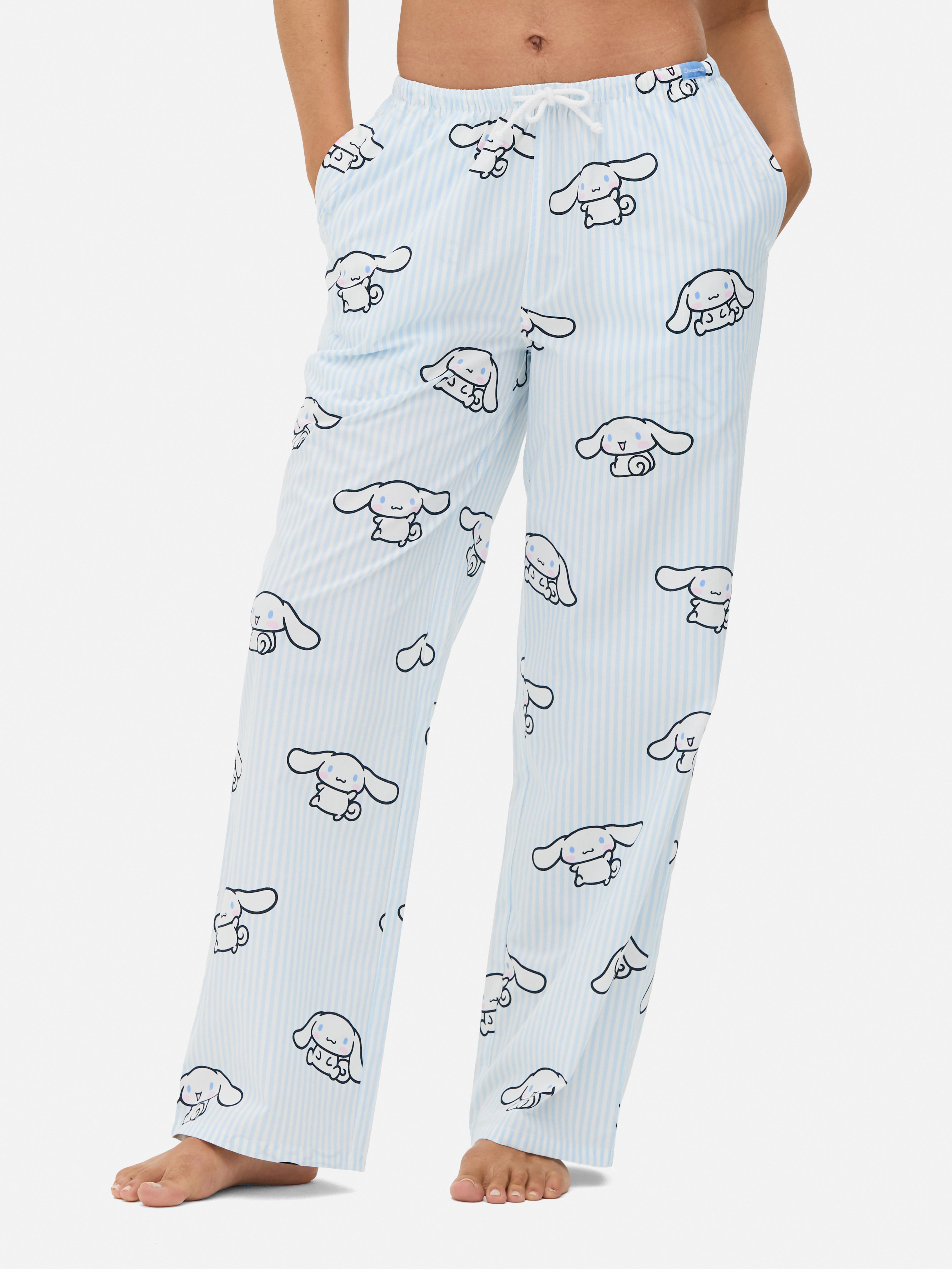 Pantaloni de pijama Hello Kitty și prietenii. Pantaloni de pijama cu șnur, buzunare laterale și personaje Hello Kitty.