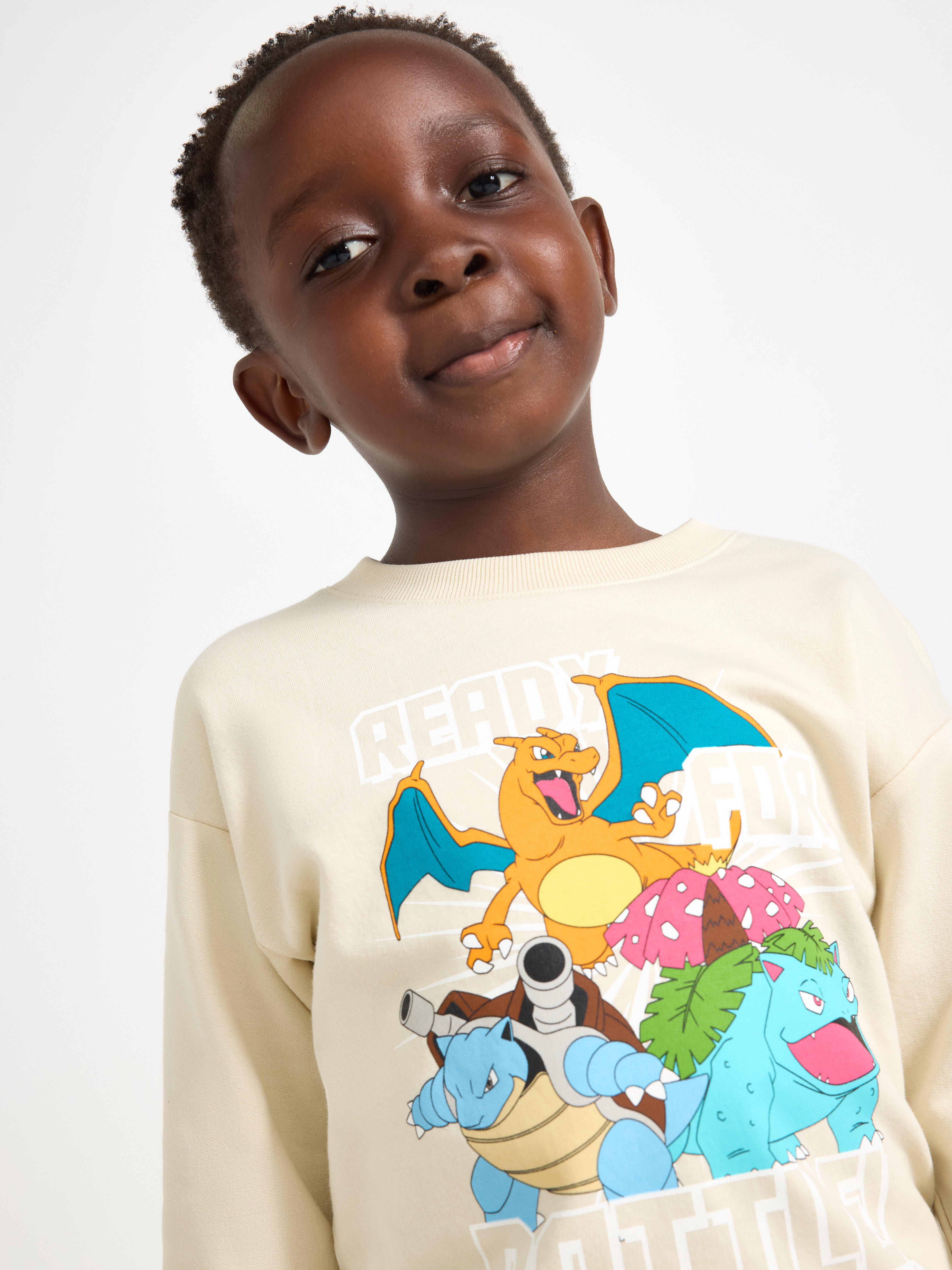Sudadera Pokémon color beige claro